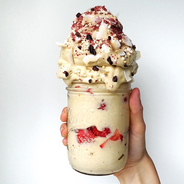 Totally_forgot_to_post_but_I_had_this_big_jar_of_nice_cream_earlier__with_mango__vanilla_and__organicburst_Maca_Powder__and_it_was_delicious._Layered_with_fresh_strawberries_and_topped_with_coconut_chips_and_a_sprinkle_of__arcticberries_Cranberry_Pow.jpg