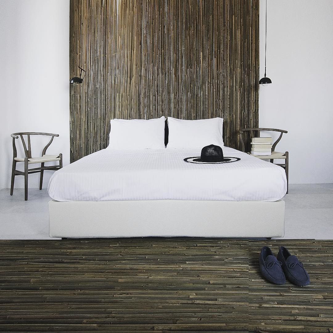 Using_natural_materials_as_textures_athanasiadisarchitects_interiors_interiordesign_whitemarble_plaster_bamboo_hanswegner_ch24_kea_keaisland_cyclades_greece_by_alx_ath.jpg