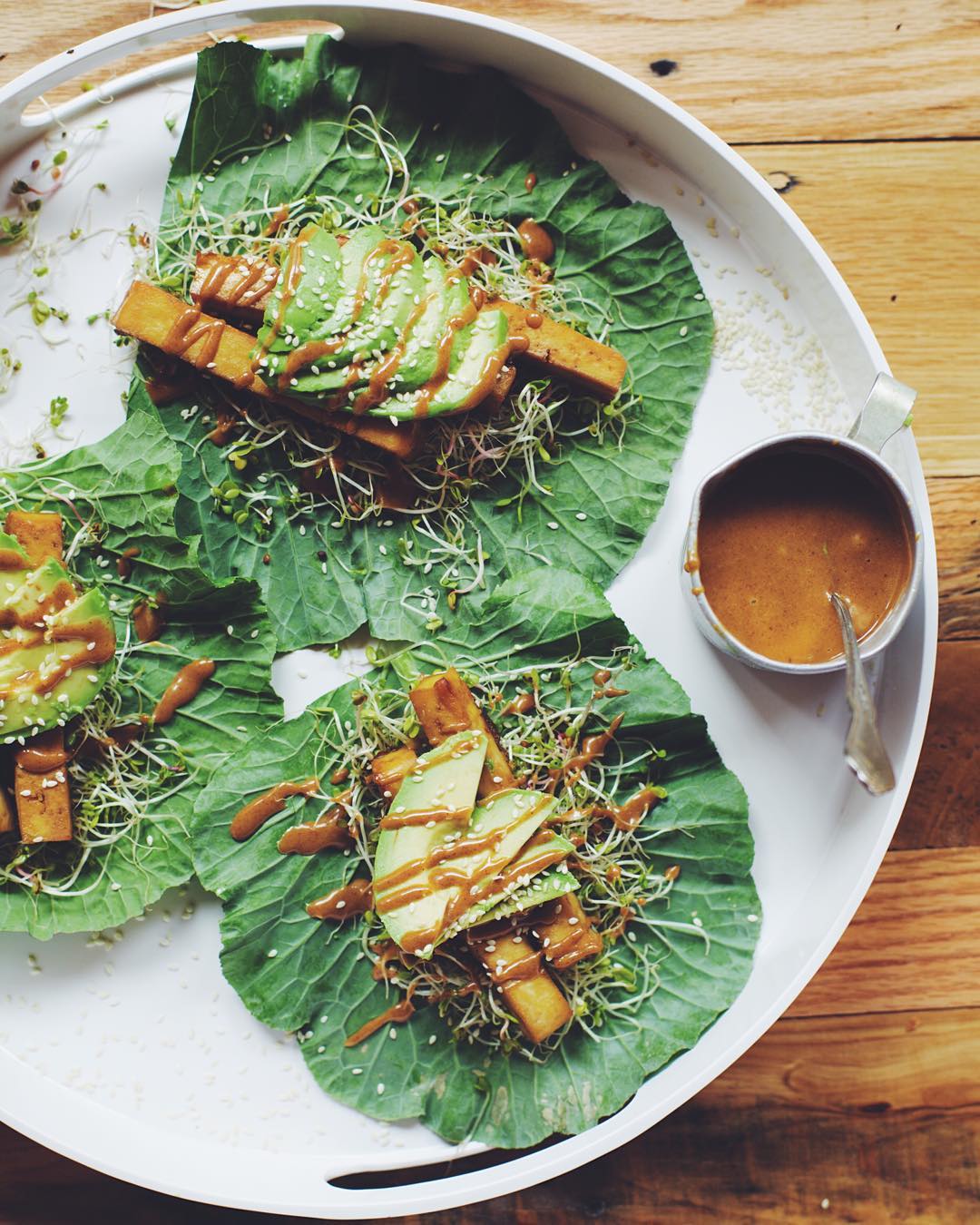 Took_an_old_recipe__improved_upon_it__and_came_out_with_these_Crispy_Orange_Tofu_Collard_Wraps_with_Peanut_Sauce._This_recipe_will_make_you_glad_you_are_a_human_who_is_alive_and_has_tastebuds.____celebratehealthier_by_brewinghappiness.jpg