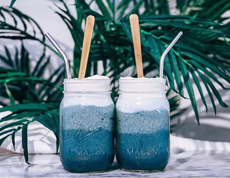 As_most_the_country_cuddles_under_blankets_of_snow___rain__we_are_looking_to_sunnier_days_with_this_ocean-inspired_smoothie_from__bysaber._She_gets_this_hue_by_blending_natural_blue-green_algae_powder__frozen_bananas___tops_it_withthick_coconut_milk_.jpg