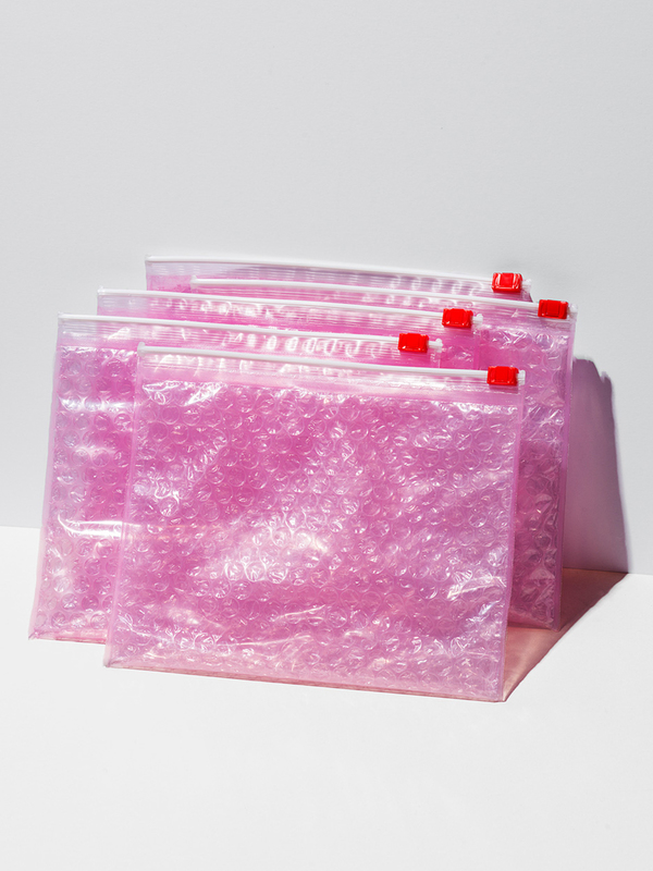 glossier-01_PinkPouch_group.jpg