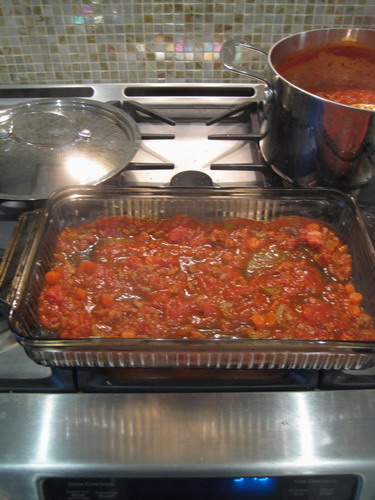 LAYER UP A LASAGNA: IN A BUTTERED PAN, START WITH A LAYER OF SAUCE