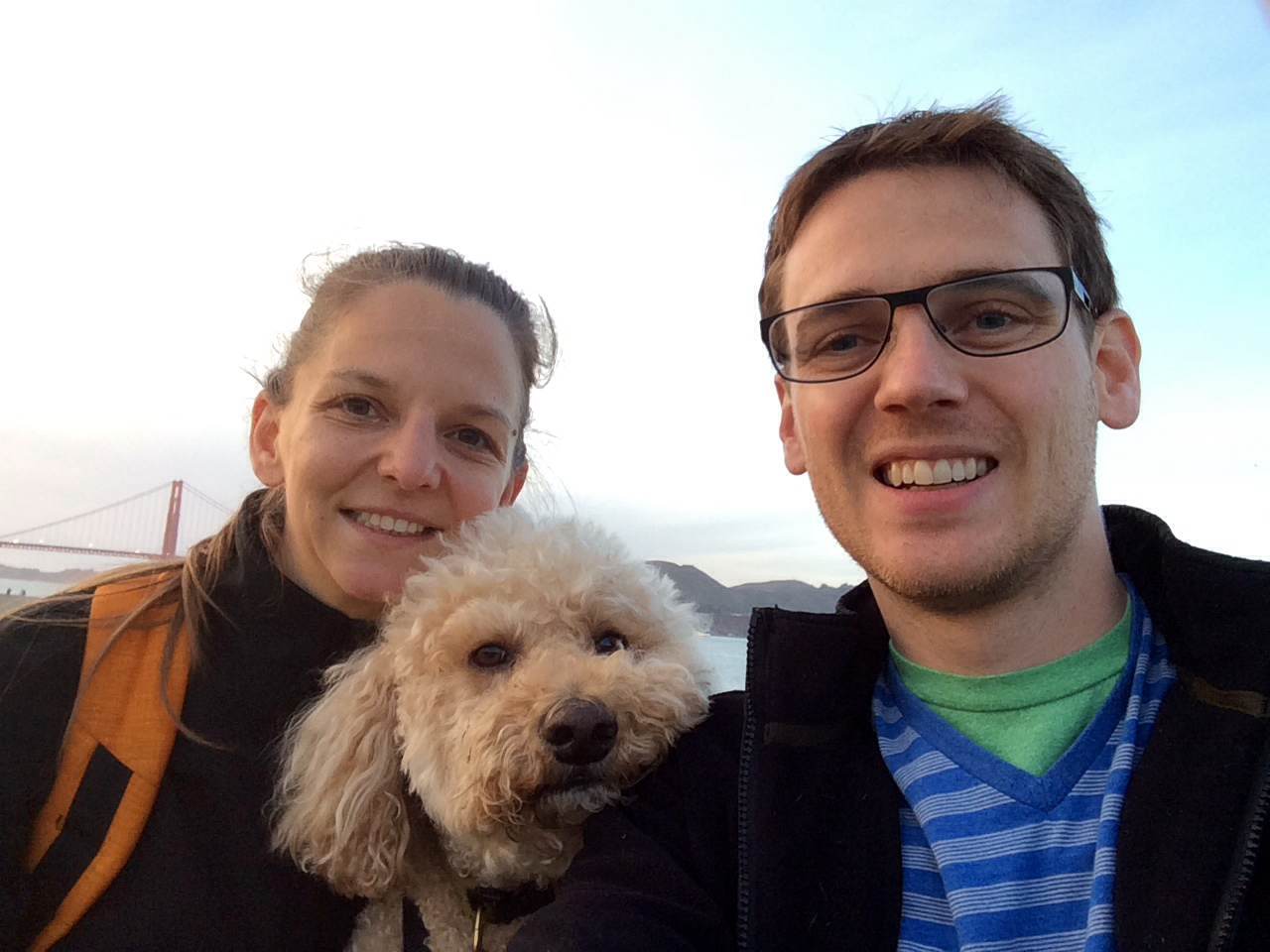 Kelly, Cole, and their loving pup, Marley, who loves to eat Eatwell Farm carrots and orange slices.