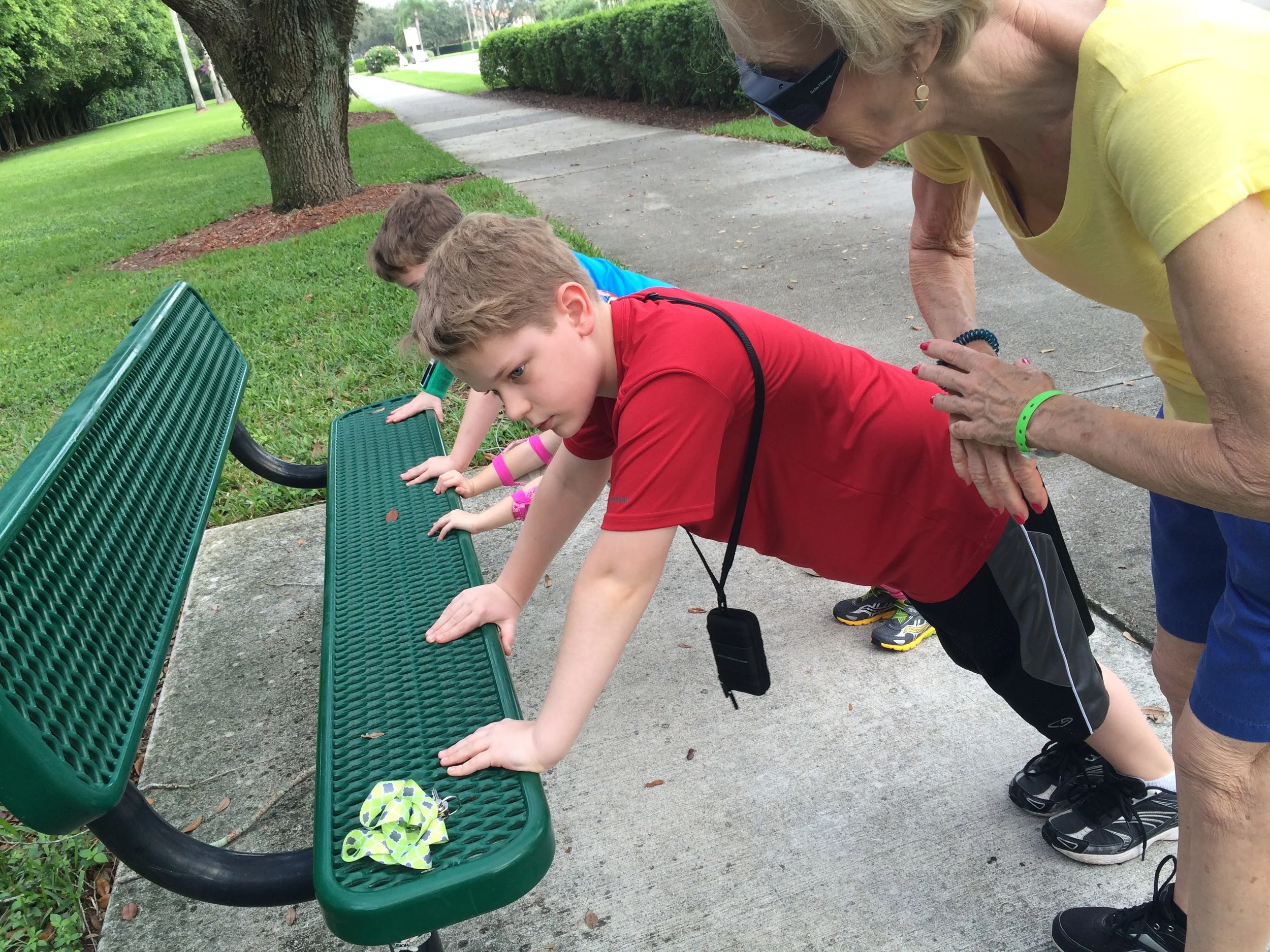 Gym Class: "Make sure you lower your chest all the way," Grandmom says.