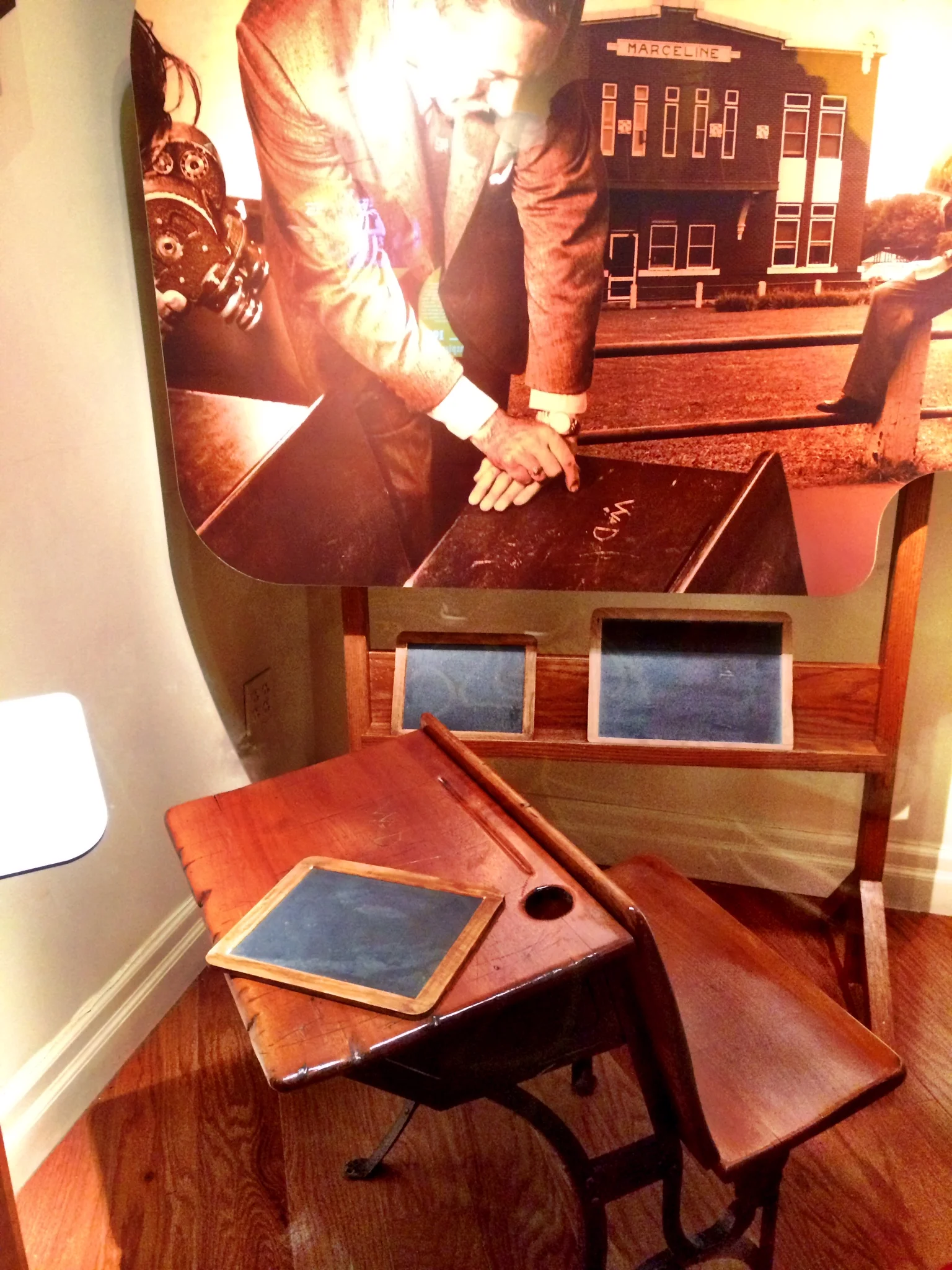 Walt carved his initials in his second-grade school desk.