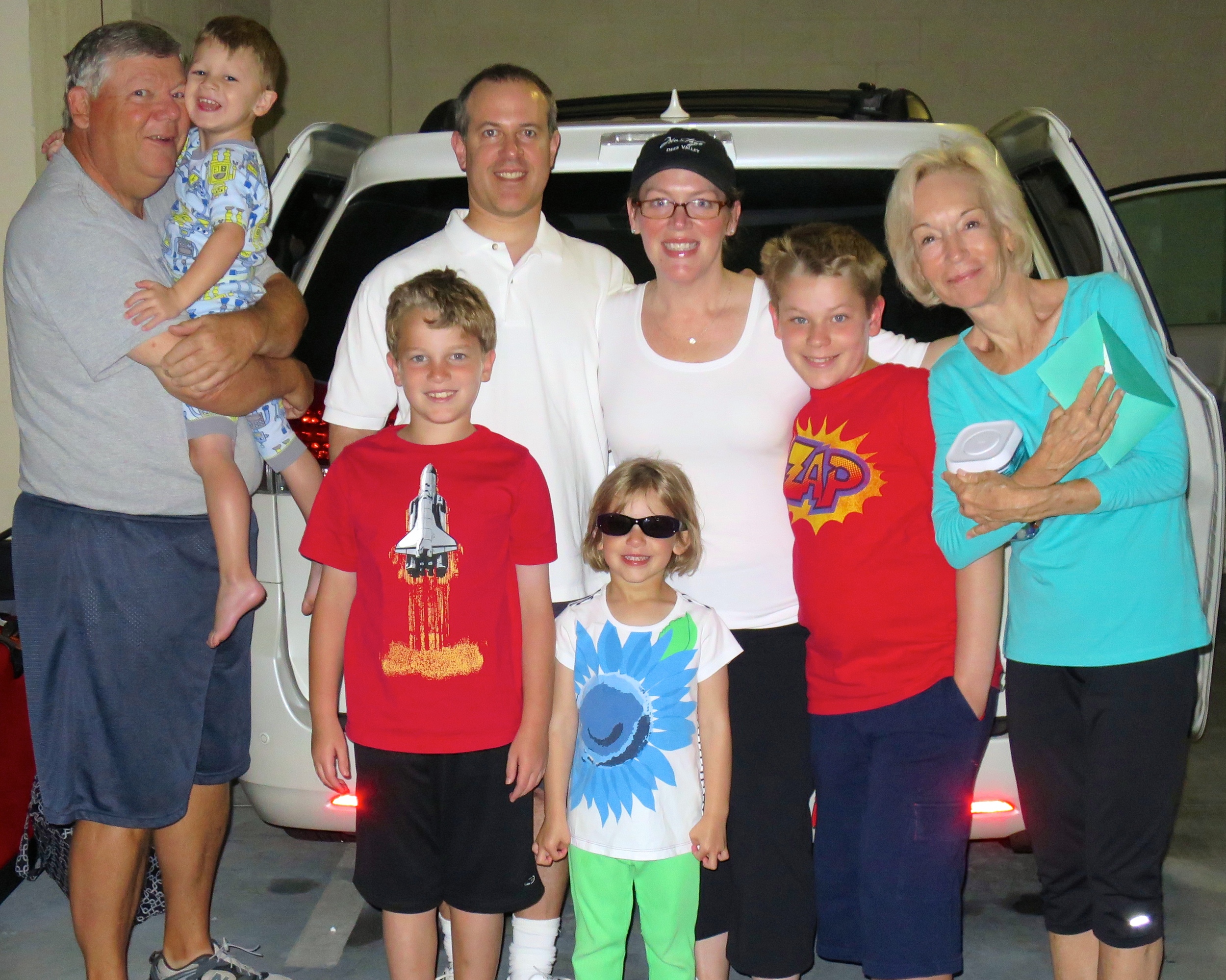 An early-morning sendoff in the parking garage.
