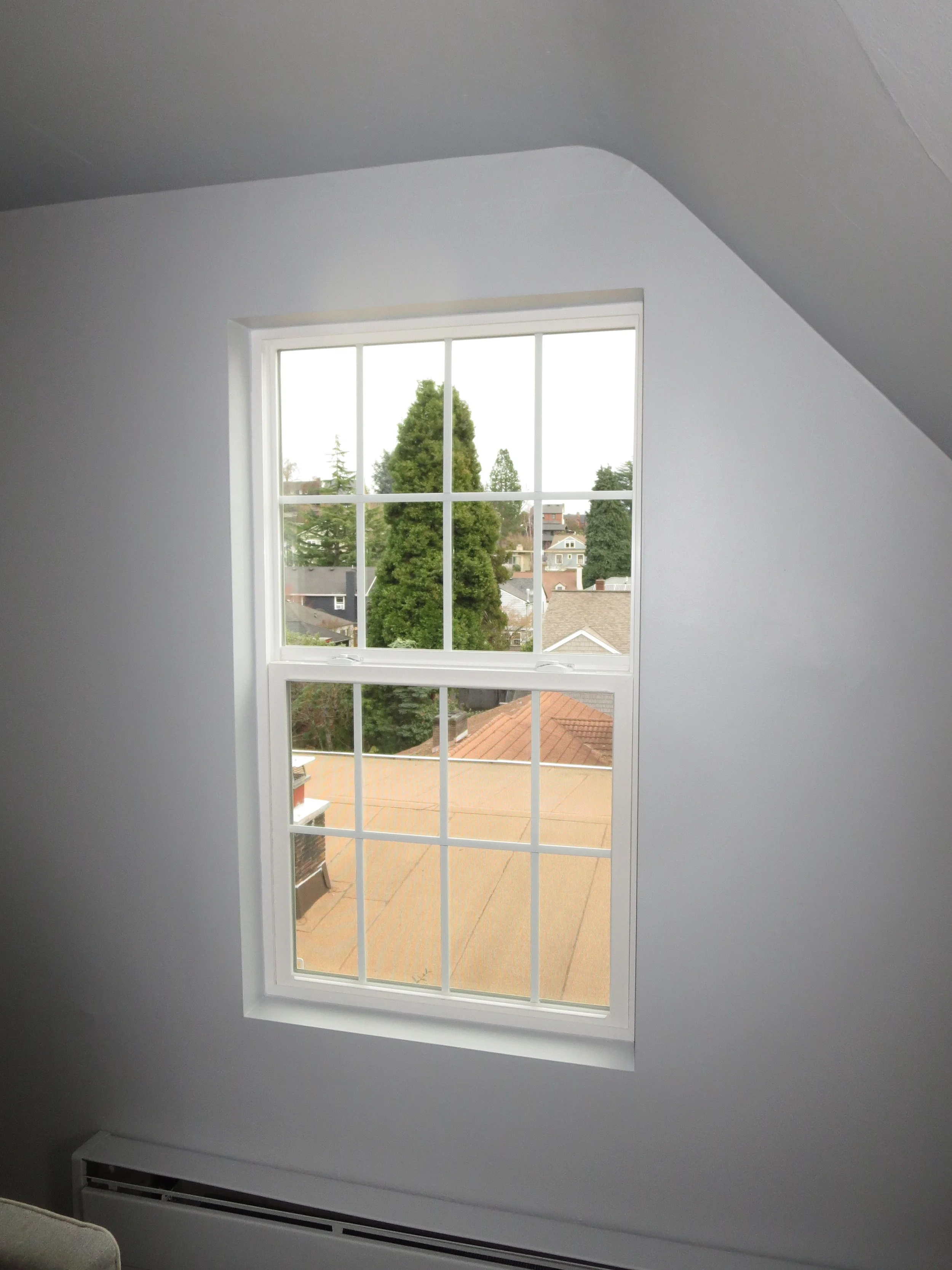 Accommodating trim-less windows — Newport Custom Shutters