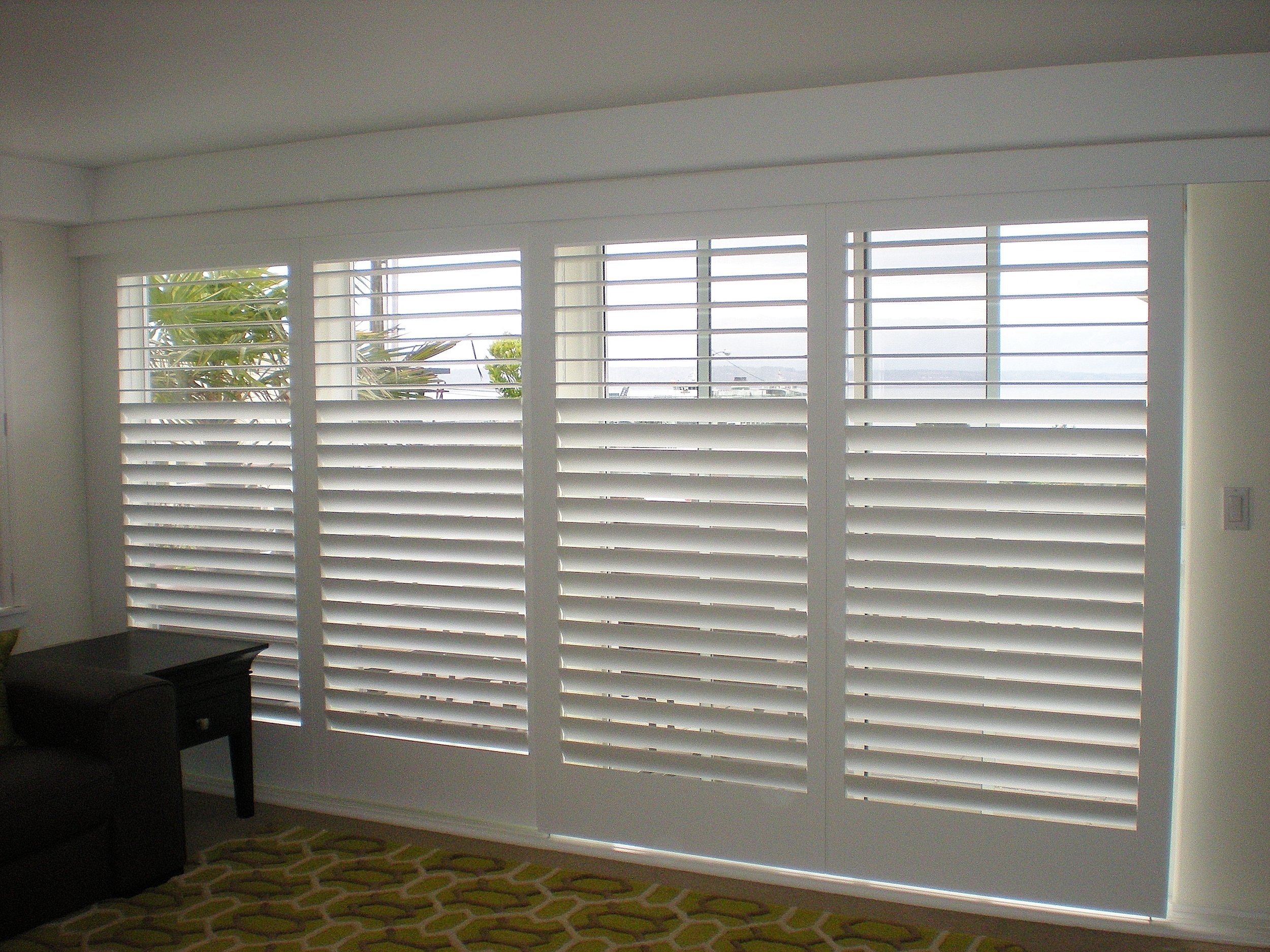 Living room shutters with louvers closed (clear view side control)