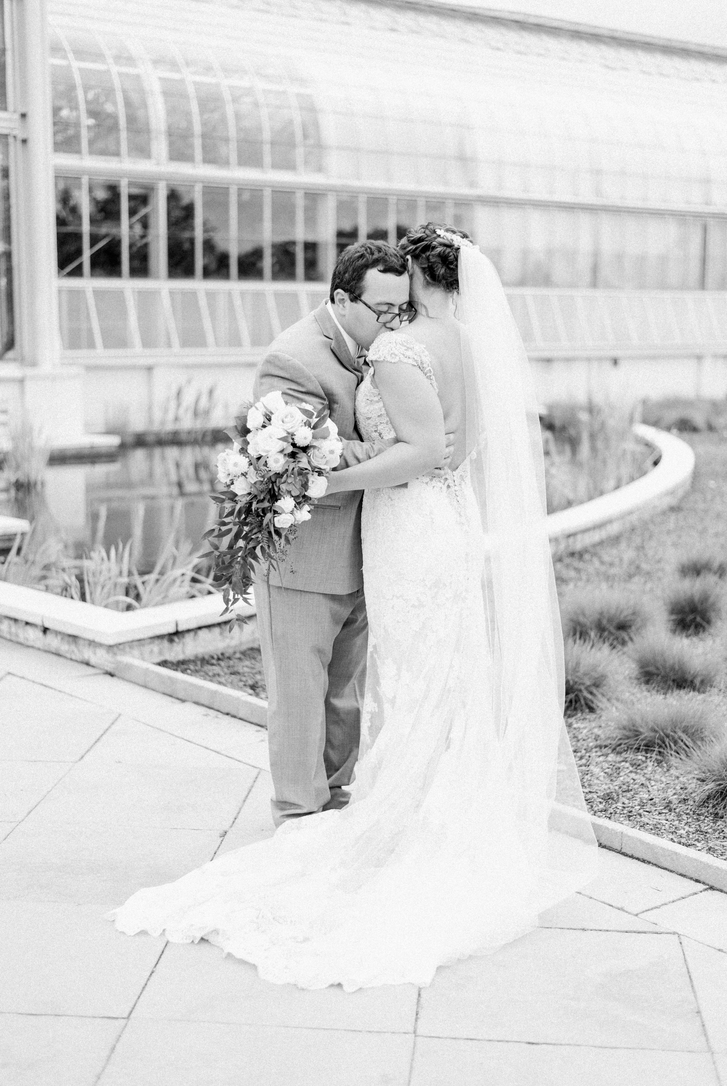 LewisGinterBotanicalGarden_richmondweddingphotographer_LynchburgweddingPhotographer_lindenRowInn_StPetersCatholicChurch_BrittneyGarrett 36.jpg