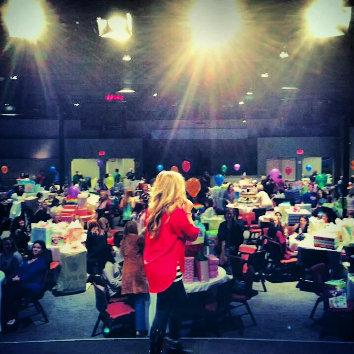 Co-Founder Amy Ford speaking at baby shower
