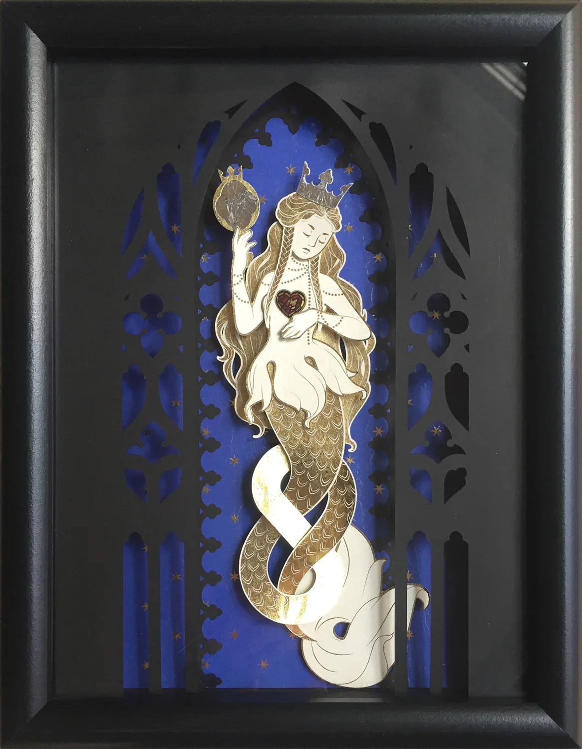 Machine cut paper, digital printing, foil, and ink on transparent film for a mermaid themed gallery show
