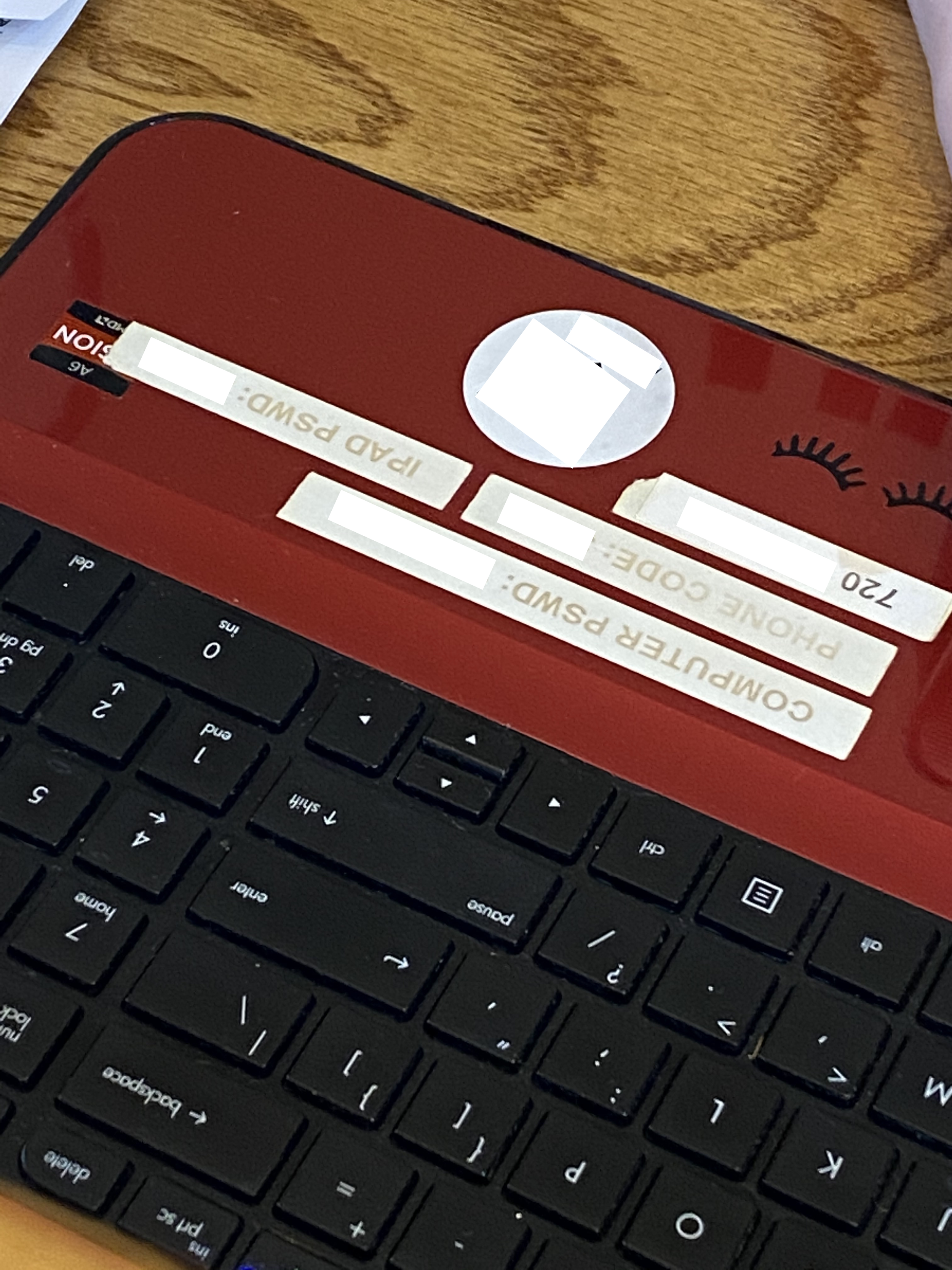 Laptop seen recently at a retail check out counter, fully visible to all customers. Many redactions made to this picture to protect the guilty.