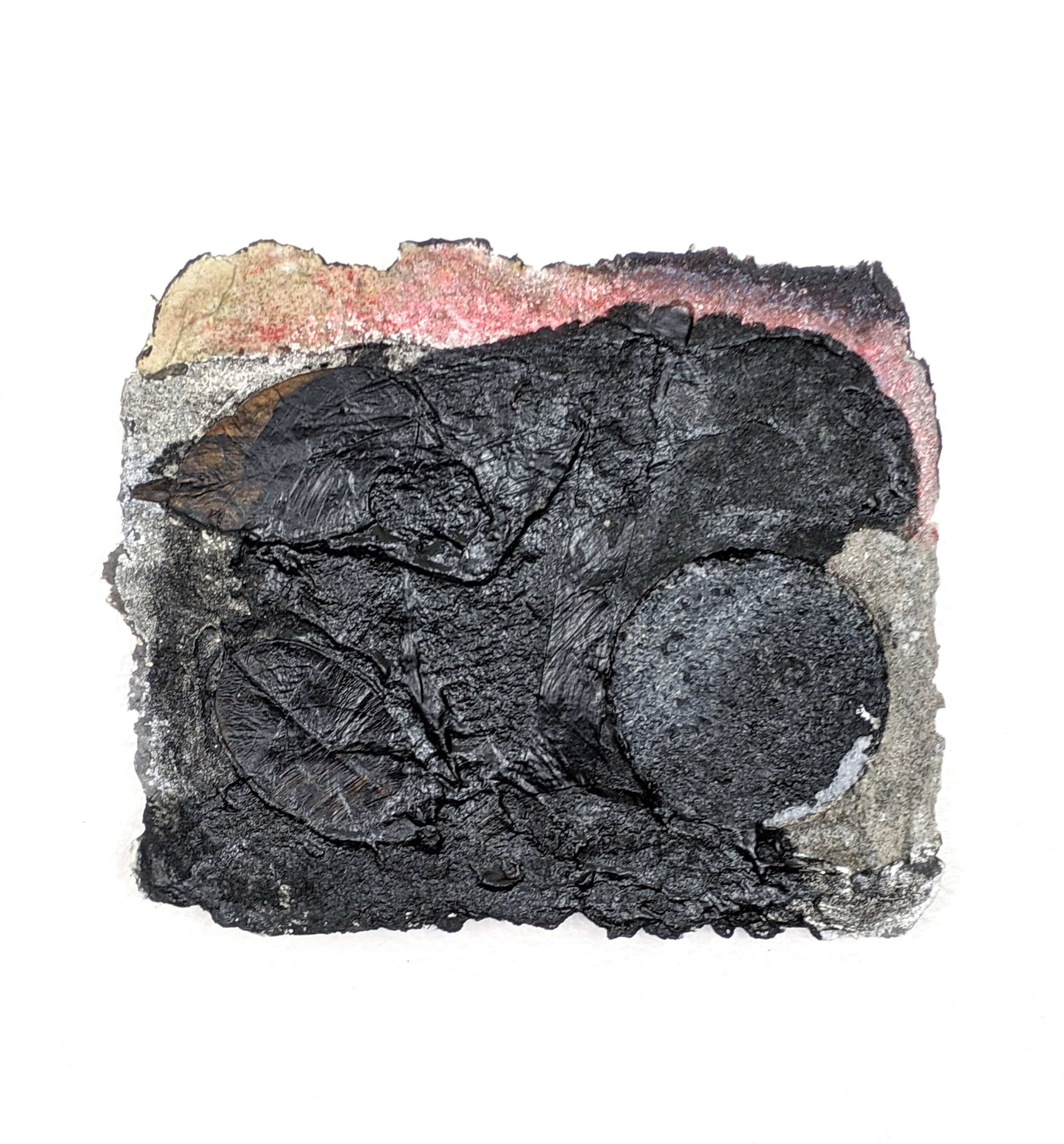 Last Impression , 2020 6.5” x 5.5” x .25” Acrylic, money tree leaves, colored pencil, beach sand, paper pulp Image description: A dark wave-like form envelops a circular impression left in the rectangular piece of handmade sandpaper, as well a