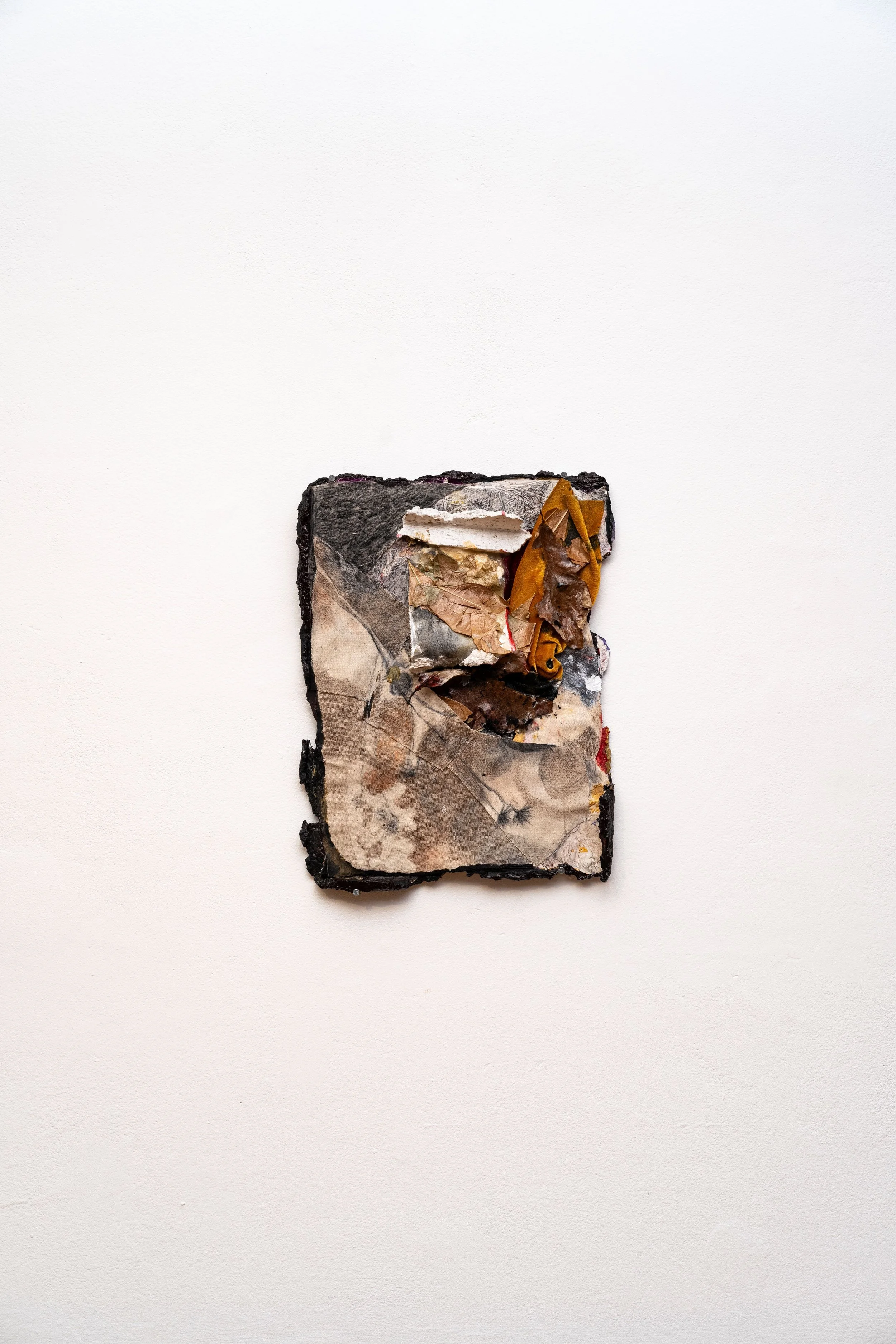 Years pile into one dull feeling at the bottom of your coat liner that splinters and each piece becomes decades that you never want to end Mixed Media 13” x 16” x 2” 2024