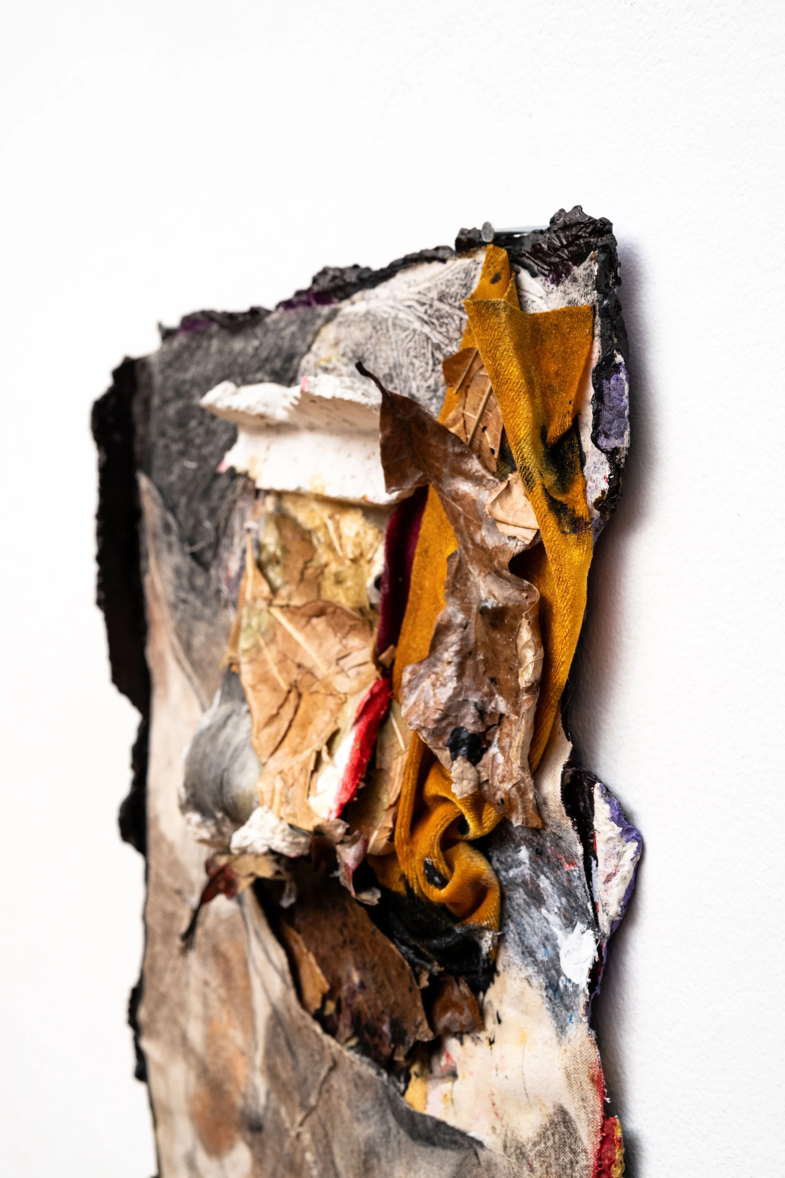 Years pile into one dull feeling at the bottom of your coat liner that splinters and each piece becomes decades that you never want to end Mixed Media 13” x 16” x 2” 2024