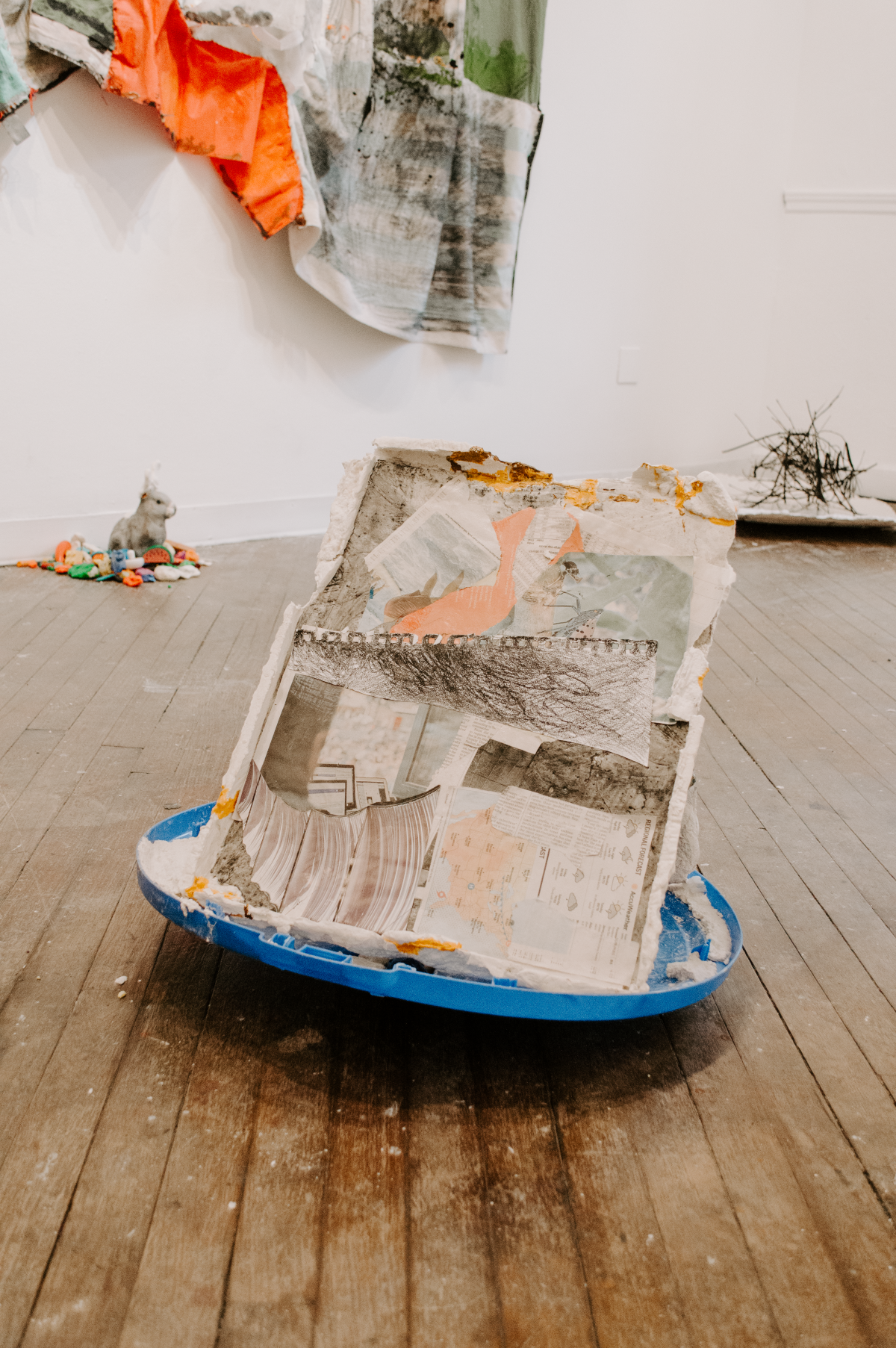 Installation view of Hold On, I Love You, a solo installation at Pink Noise Projects in February 2025. Hold On, I Love You explores early parenthood and navigating relationships with self, loved ones, strangers, ecosystems, and animals in tod