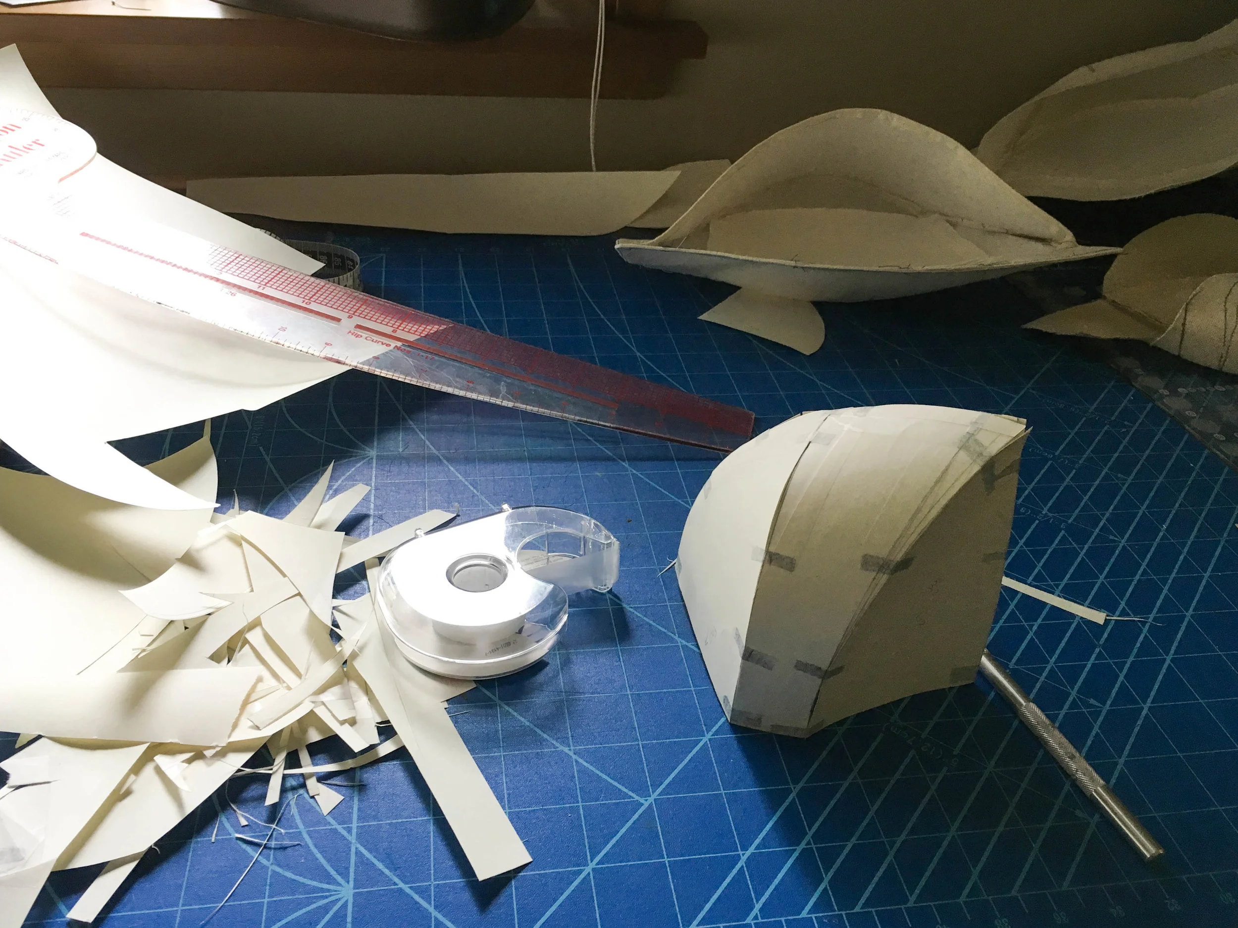 My paper pattern mockups establish curves, seam lengths, and a better understanding of volume.