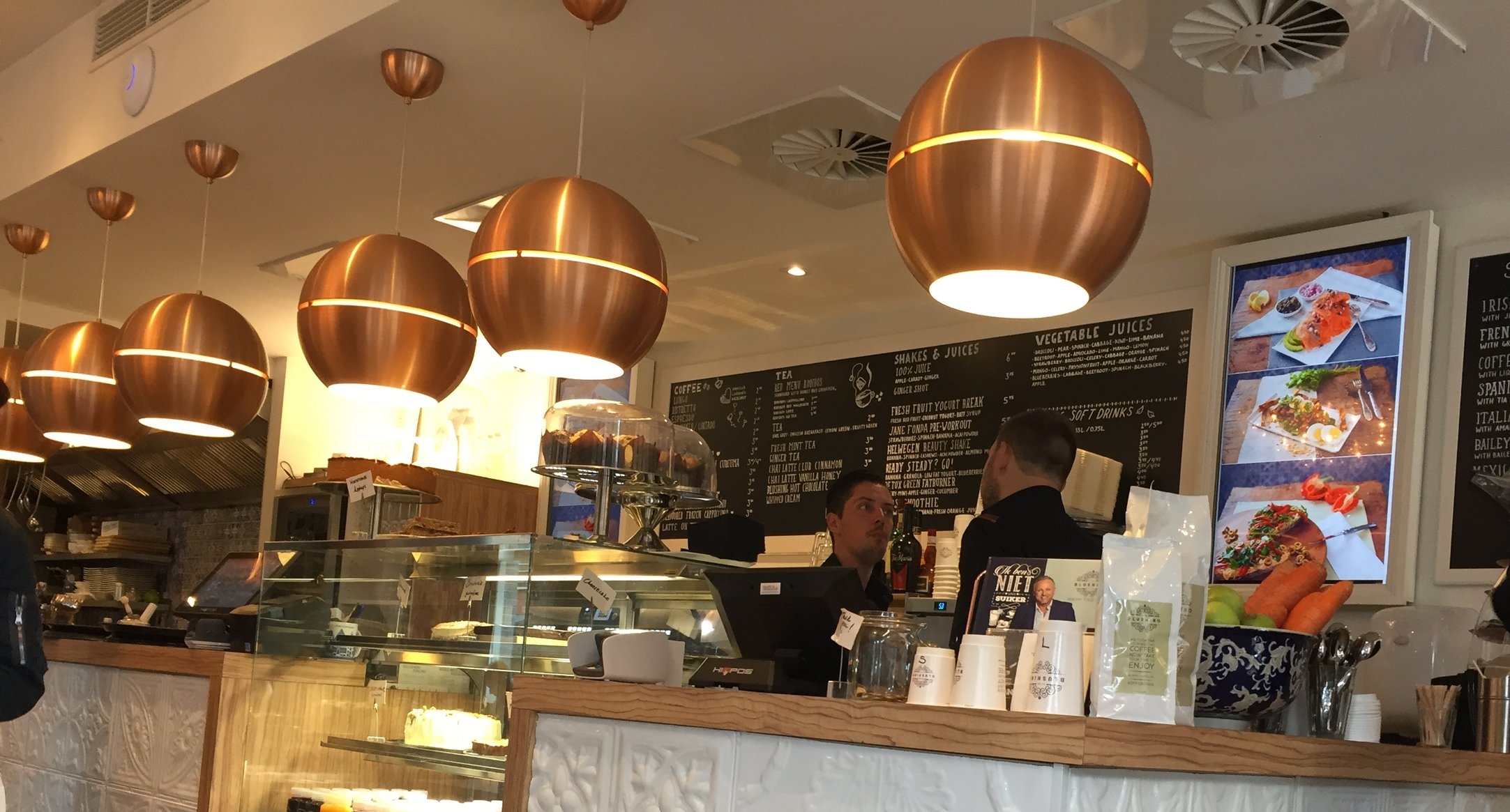 A cafe in Amsterdam with a steady flow of regulars and new customers