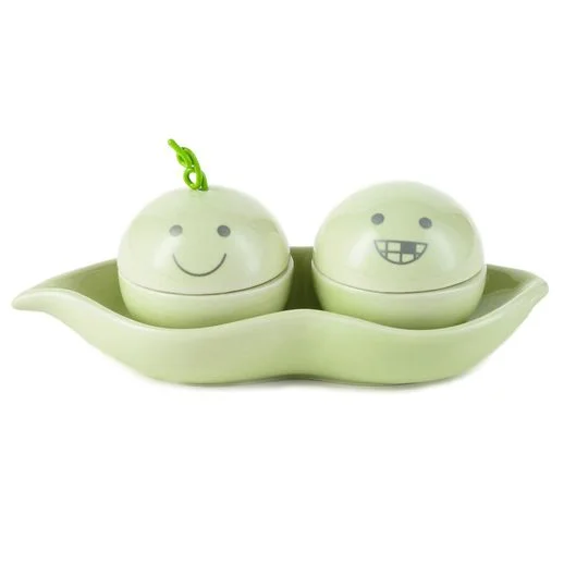 I'm not sure how to feel about this one. It's a little porcelain dish that is for a baby's first lost tooth and a curl of their hair. It was fun to do and Hallmark did a great job producing it, but I can't help but think it a bit odd.