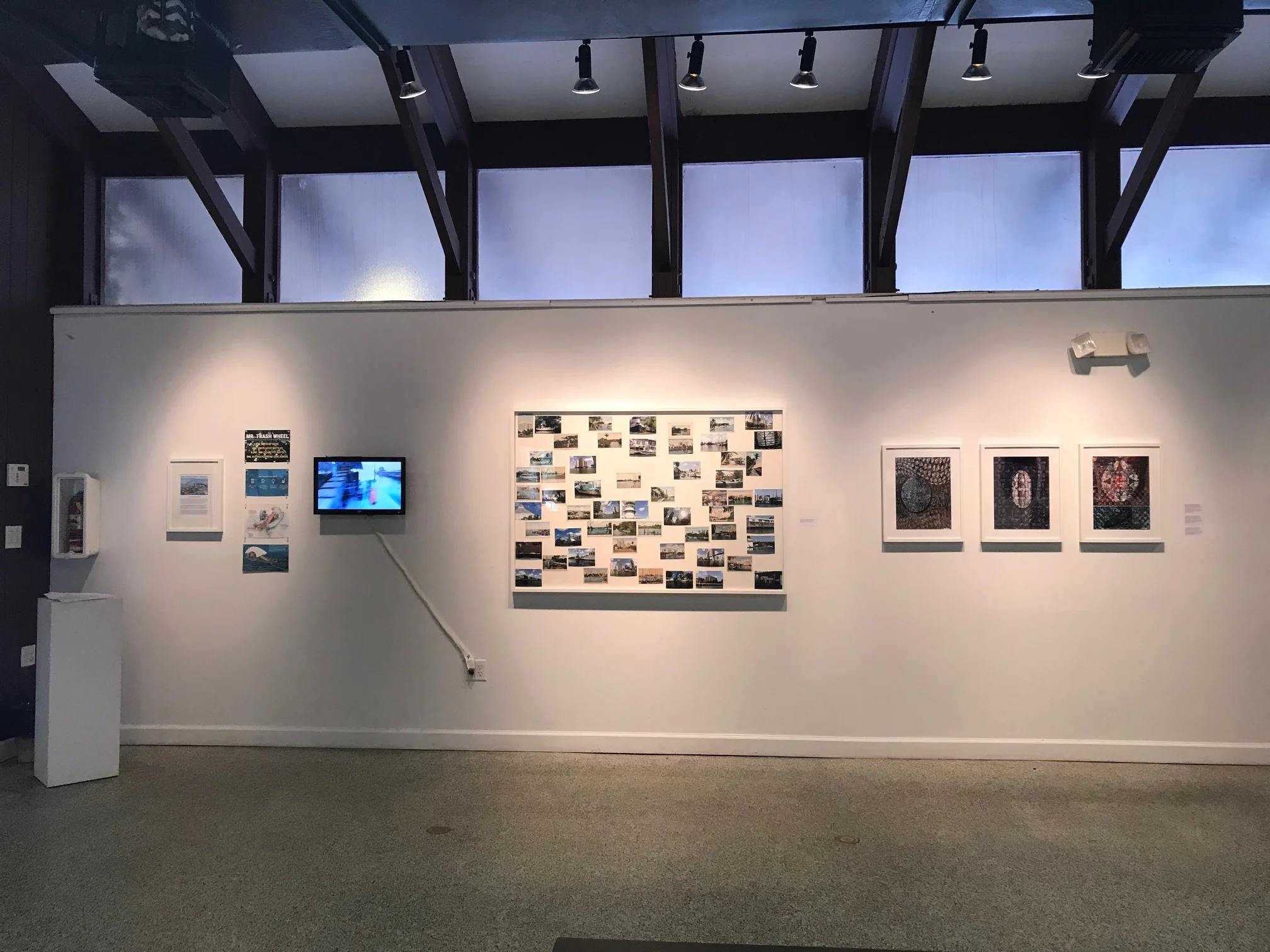 From left to right: Gustavo Oviedo , Xavier Cortada "Mr.Trash Wheel" Project 4 videos compilation Gustavo Oviedo “Miami River” , 2016 eBay items and photo prints (detail) 61” x 41 Xavier Cortada, “Just Below the Surface: 1566 ” archival ink on paper, 2015. (Limited edition print: 16″ x 12″ series; edition of 5). Xavier Cortada “Just Below the Surface: 1566 ” archival ink on paper, 2015. (Limited edition print: 16″ x 12″ series; edition of 5). Xavier Cortada “Just Below the Surface: 1915 ,” archival ink on paper, 2015.