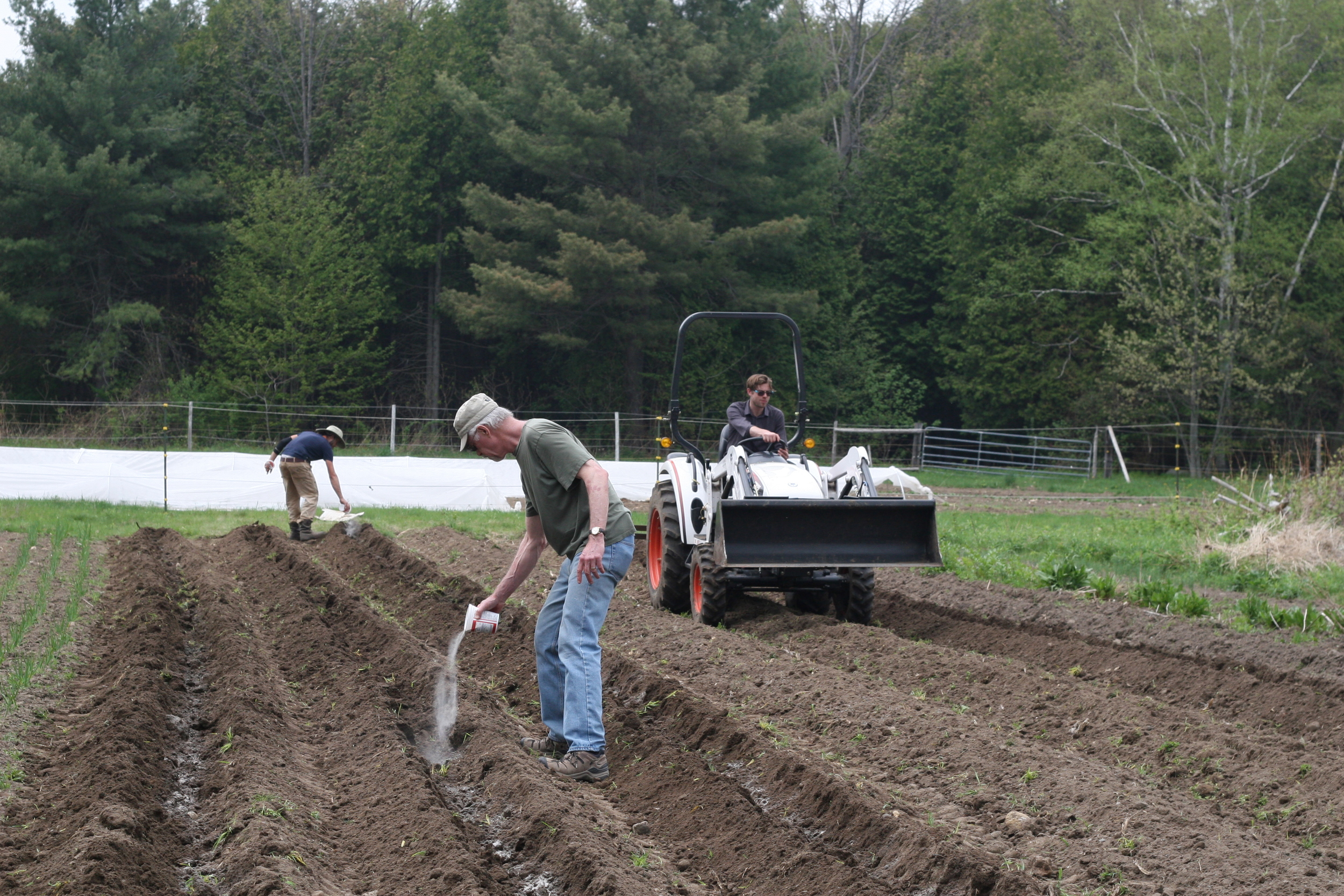 Barnhorst men (Eric, his dad Dick and brother Kevin) prep the field.