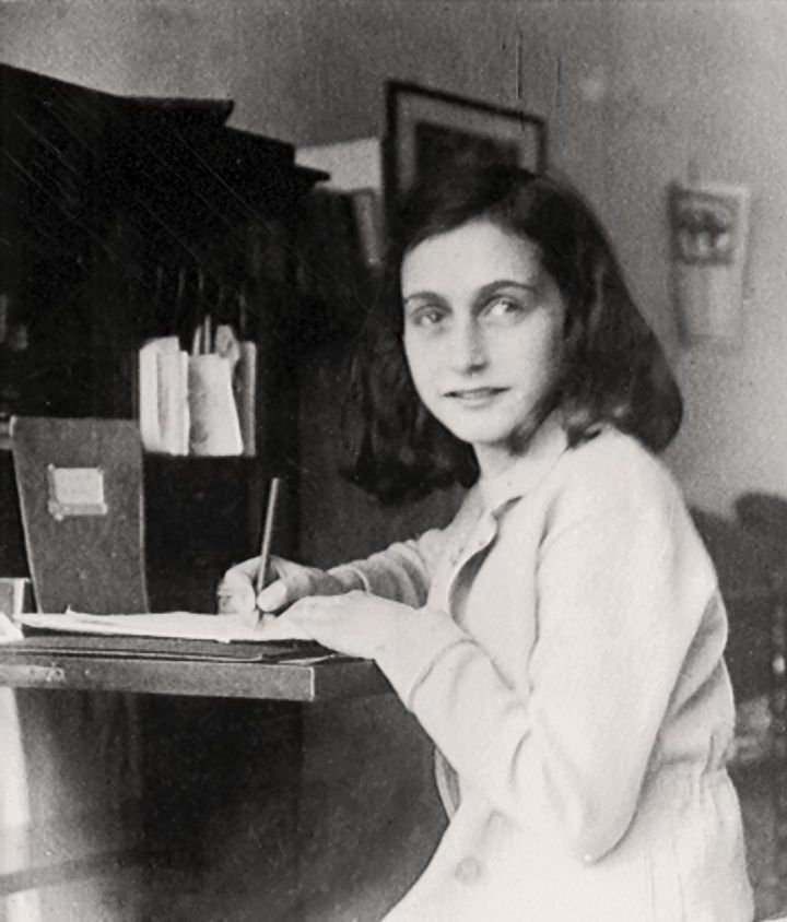 Anne Frank at her writing desk