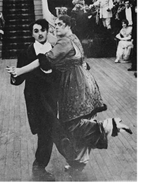 Charlie Chaplin and Marie Dressler in TILLIE’S PUNCTURED ROMANCE (1914)