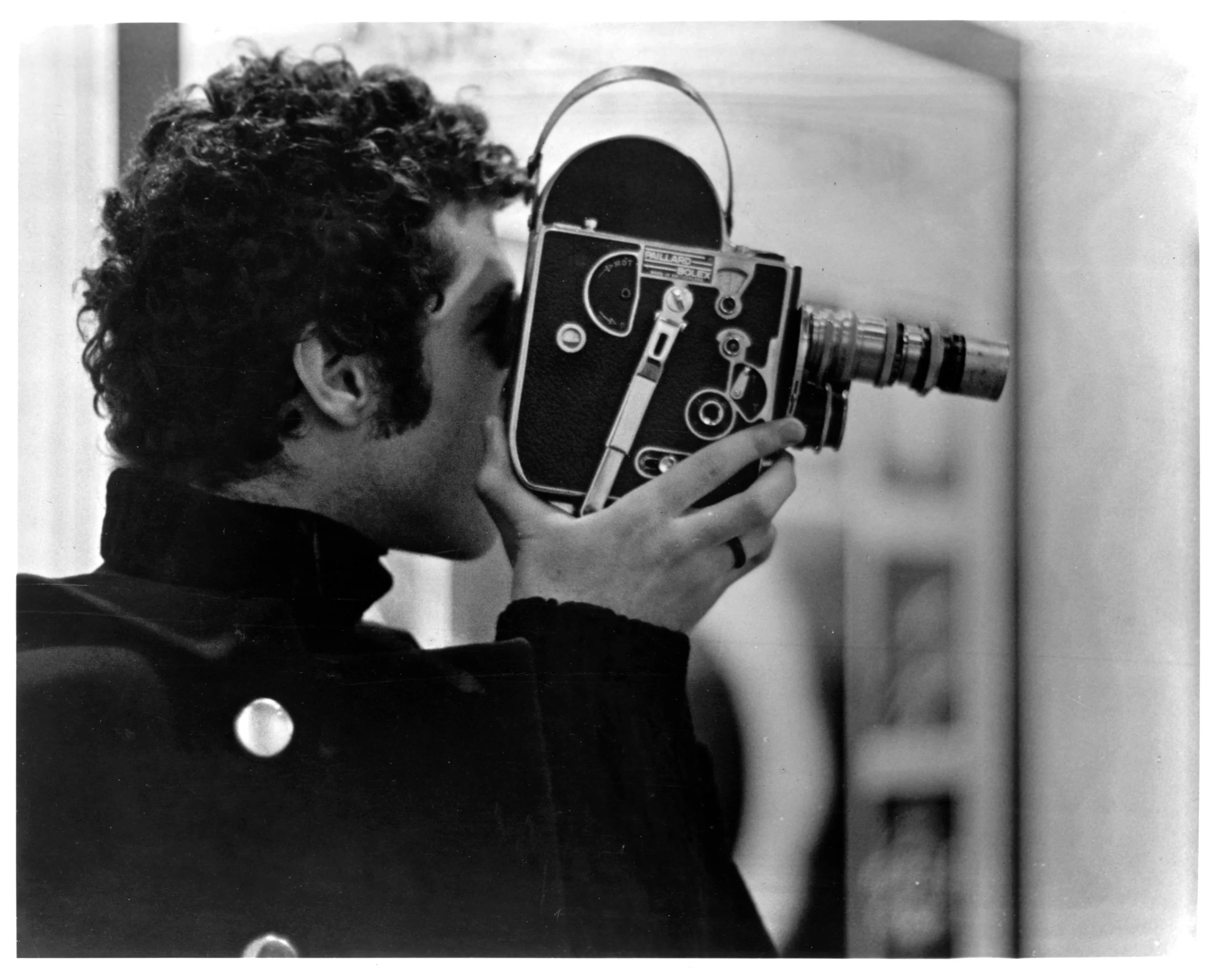 Warren Sonbert with his Bolex camera.