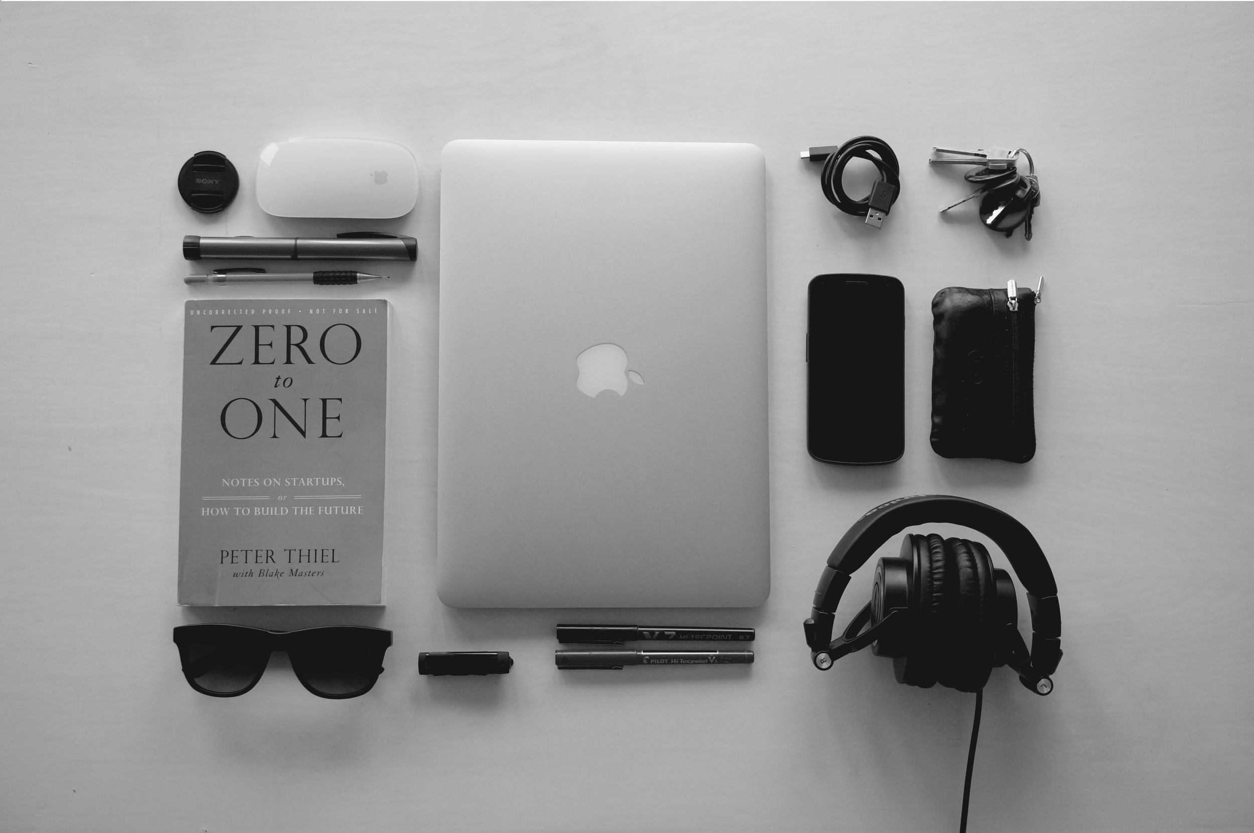 Everything costs money. Even that little black thing in between the sunglasses and pens, and I don't even know what that is.