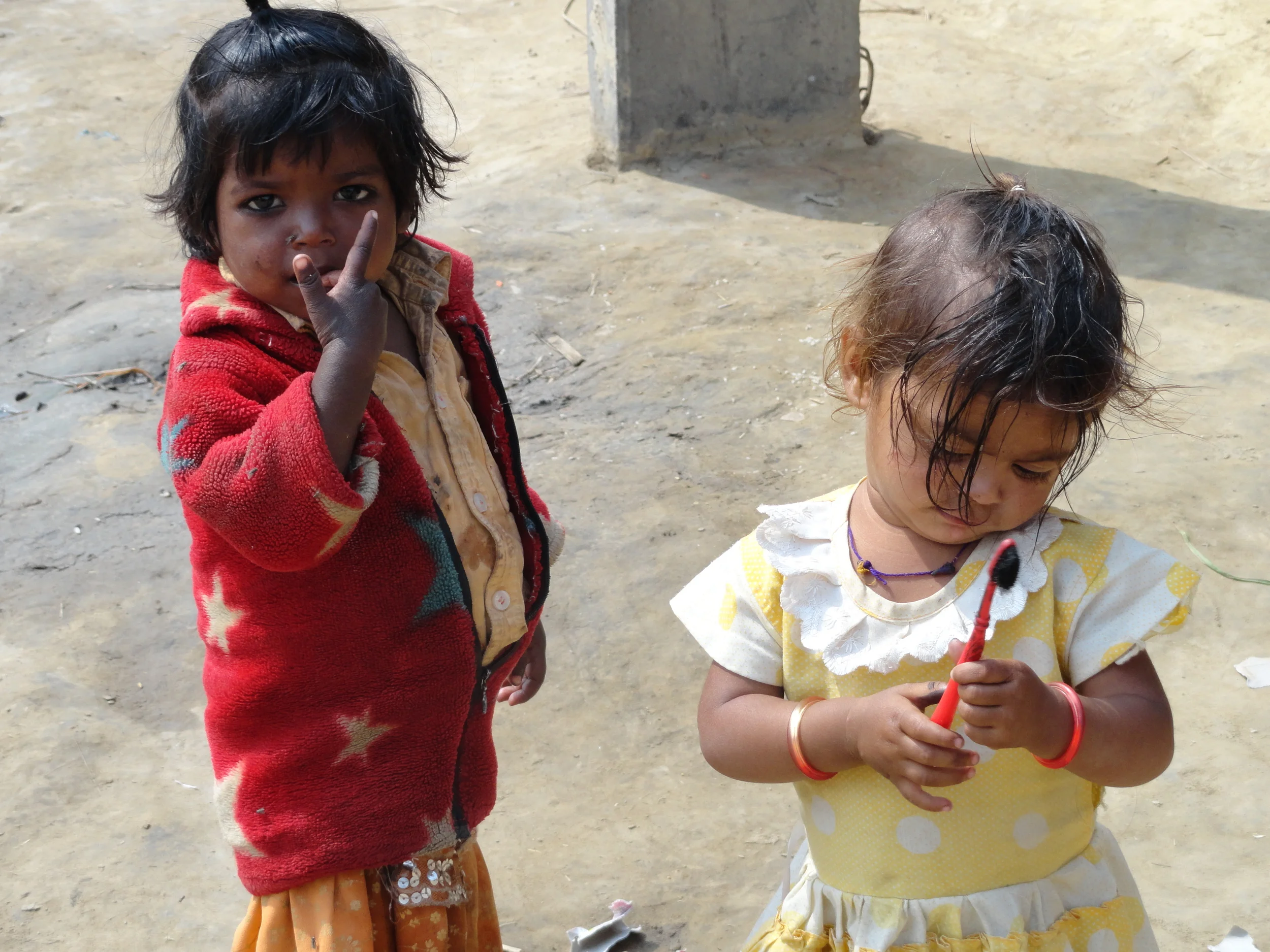 Community volunteers visit local schools to help teach children the basics of hygiene - like washing their hands before eating or using a toothbrush. On special occasions, like Christmas, they are able to pass out hygiene kits containing soap, toothbrushes, combs, etc. - Photo courtesy of CHETNA Staff. 