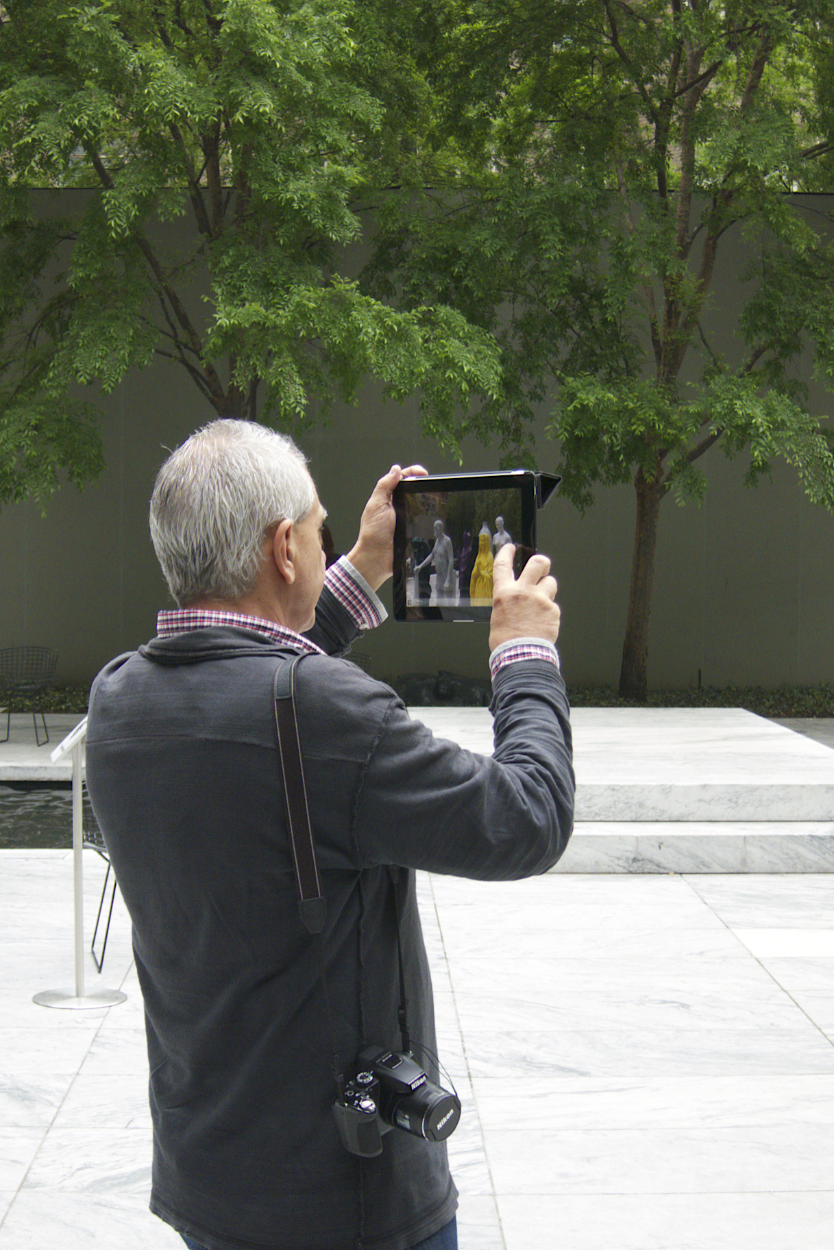 NYC Icons: Hip iPad Photographer at MoMA