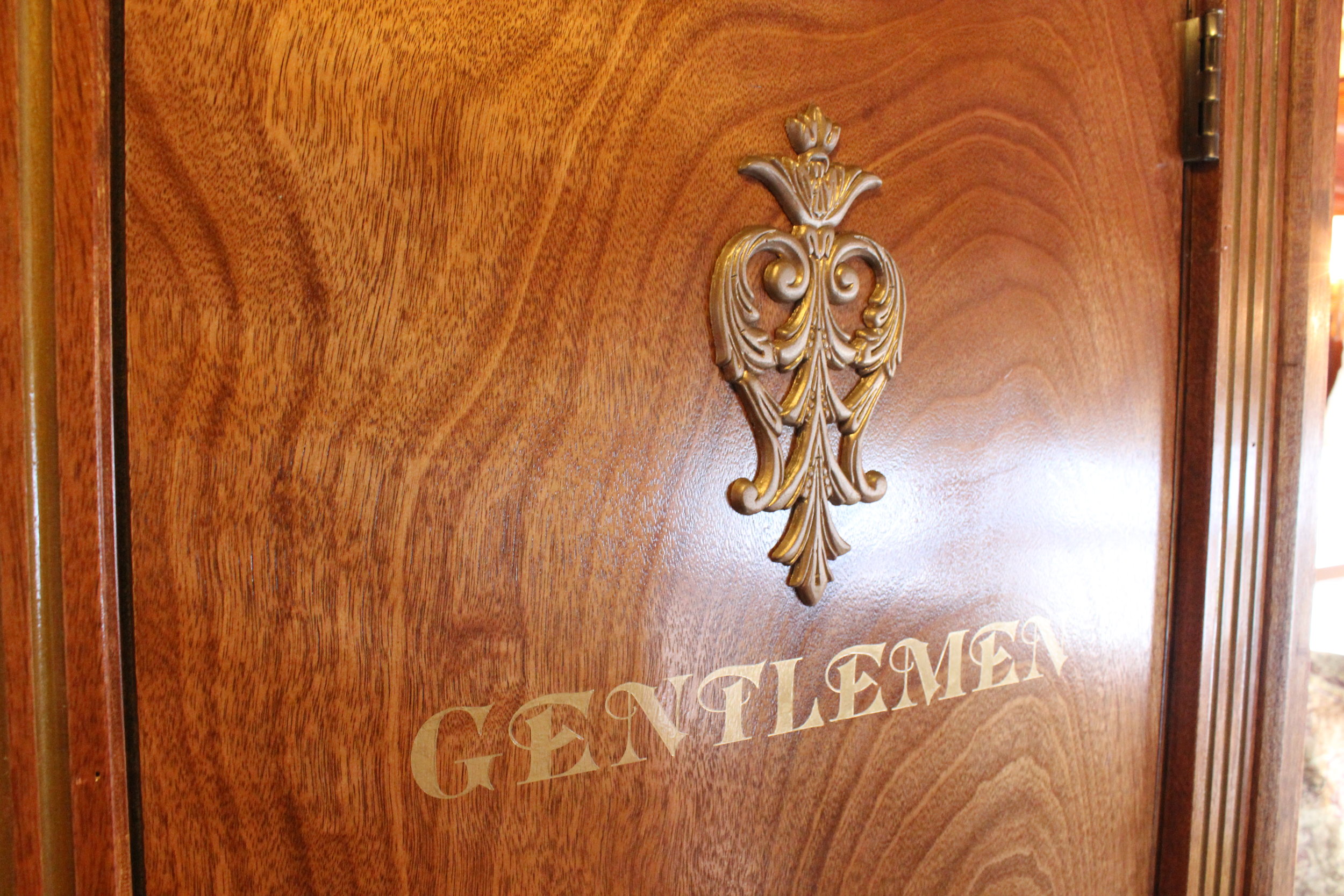 First-Class Parlor Interior: Hand-Carved Doorway