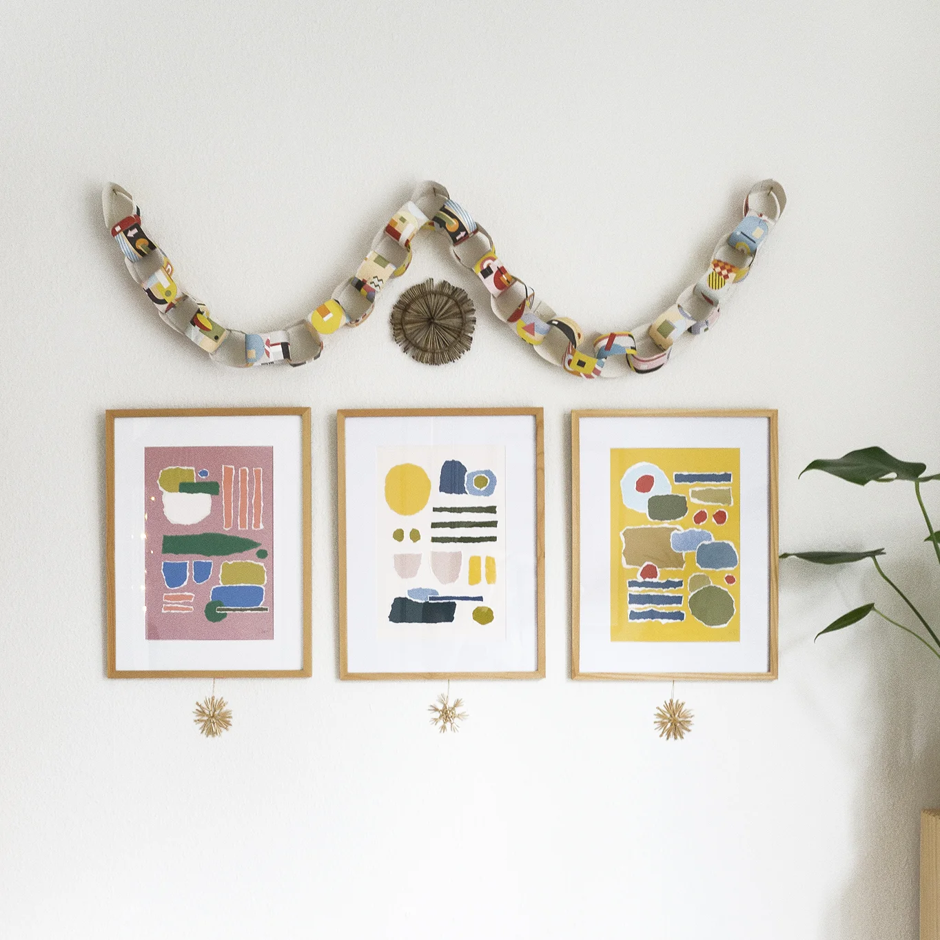 A garland made from wallpaper sample sheets