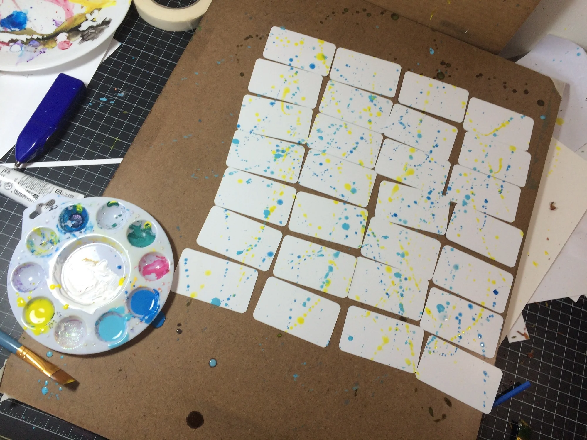 Splatter painting my cards.