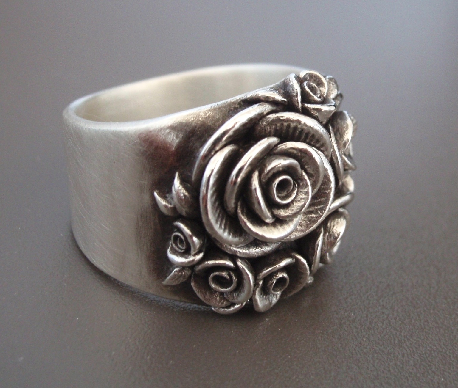   A finished Bouquet of Roses, wide-band ring.  