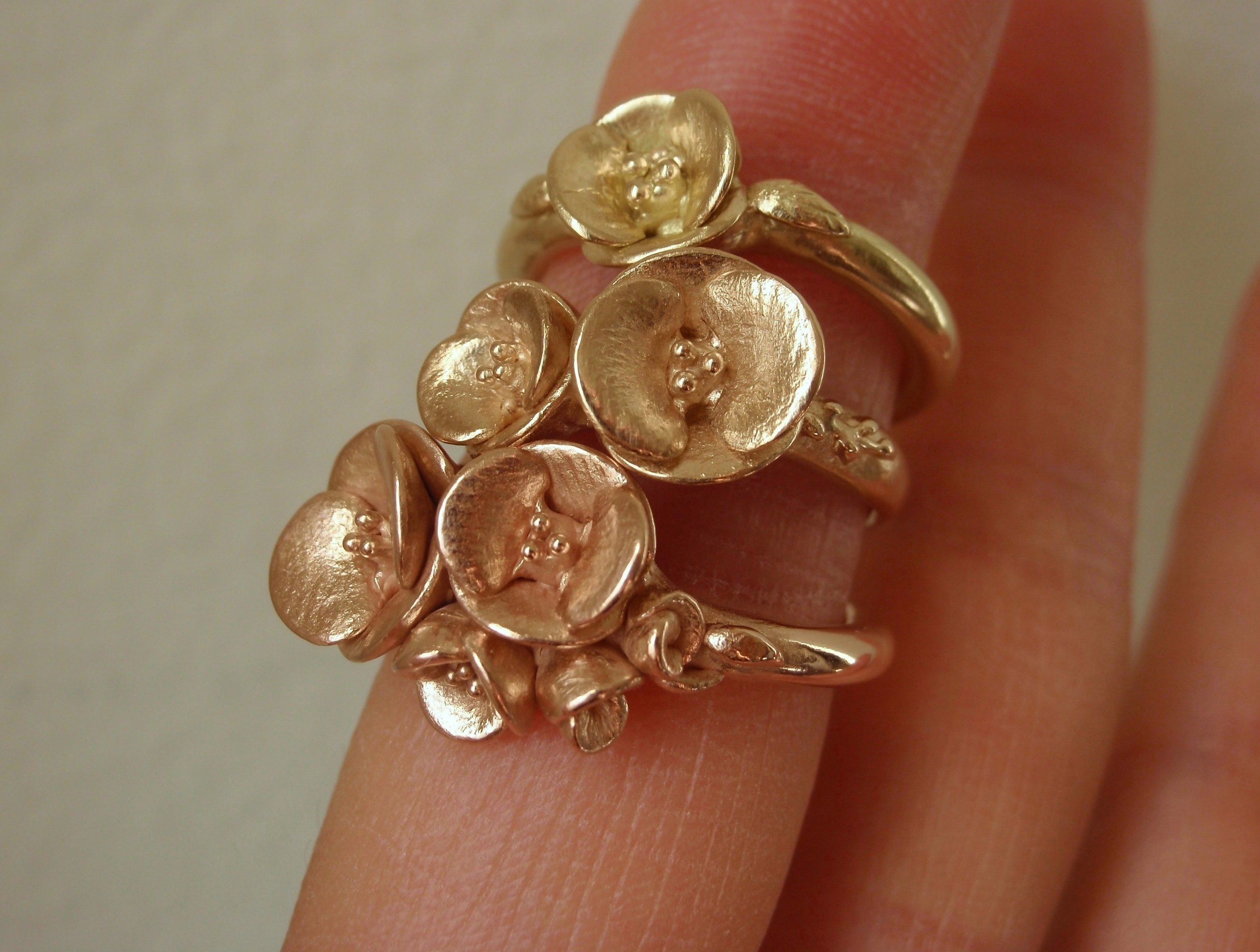  Poppy Rings in 14K Rose, Peach, and Yellow Gold. 