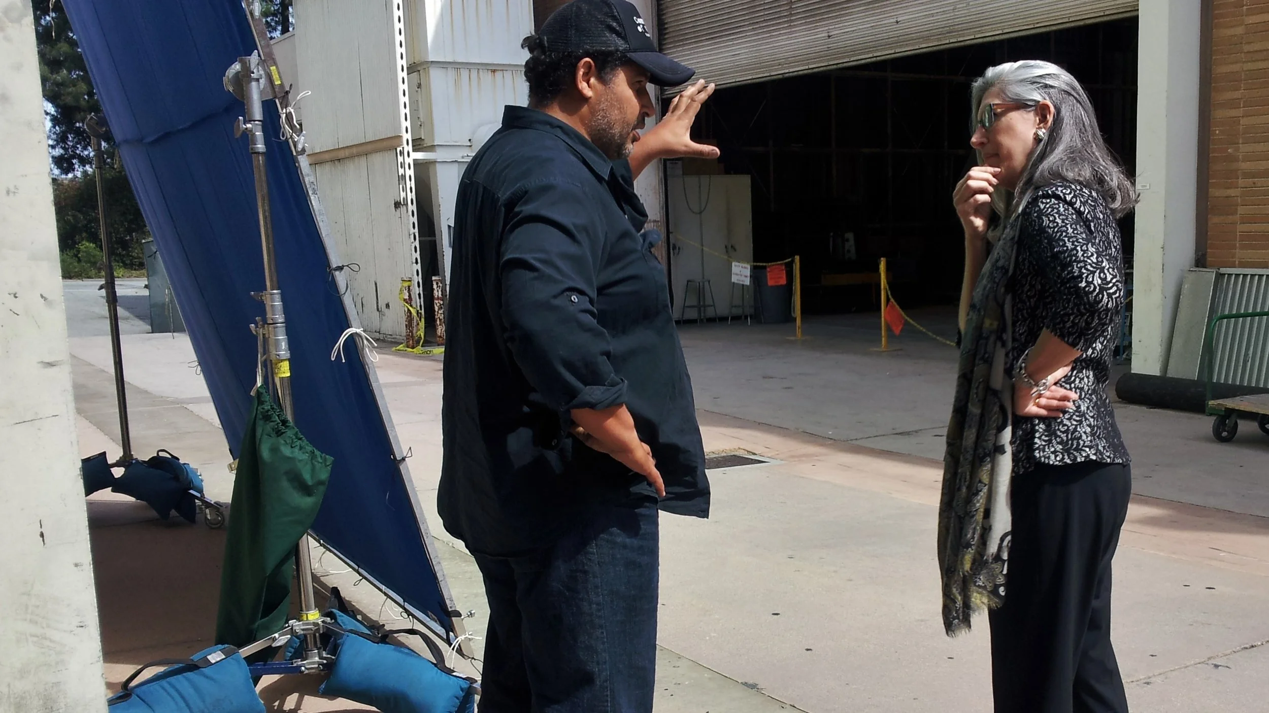 Director Matt Boatright-Simon setting up a shot against green screen with Academy Award-nominee Debra Landis.