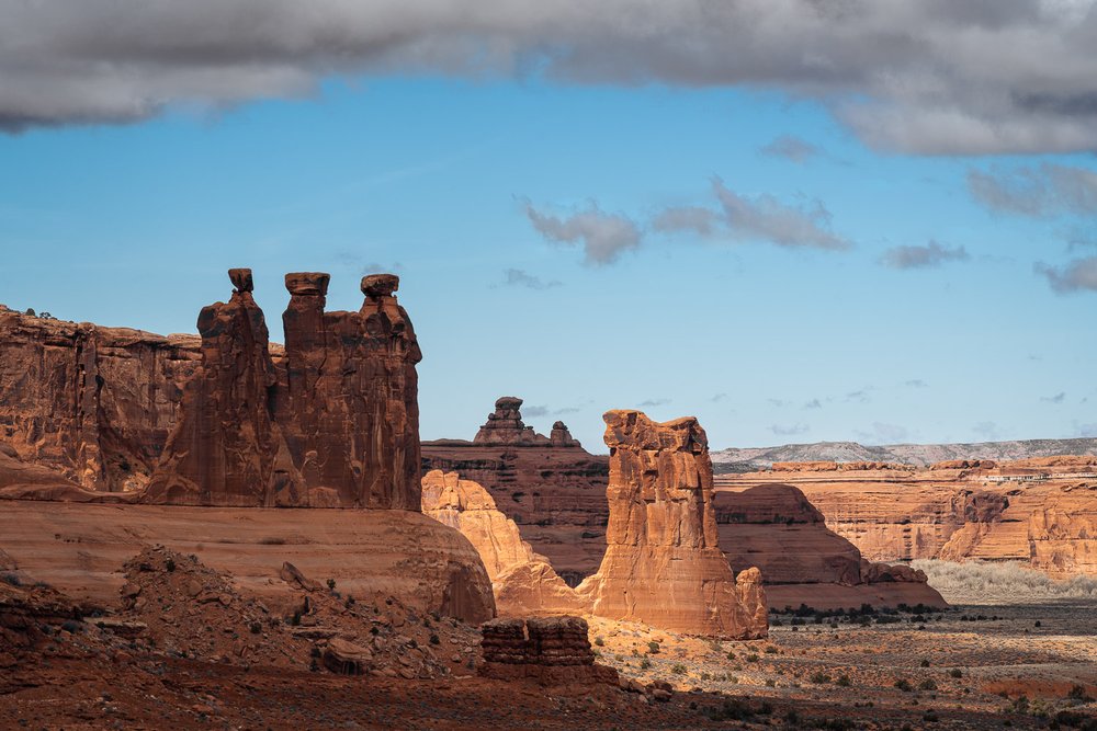 Three Gossips and Sheep Rock from La Sal Mountain Overlook.jpg