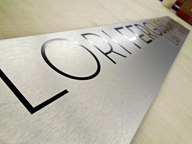 Brushed metal name sign.jpg