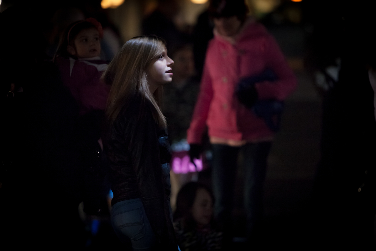 A young participant fixated by the work. 