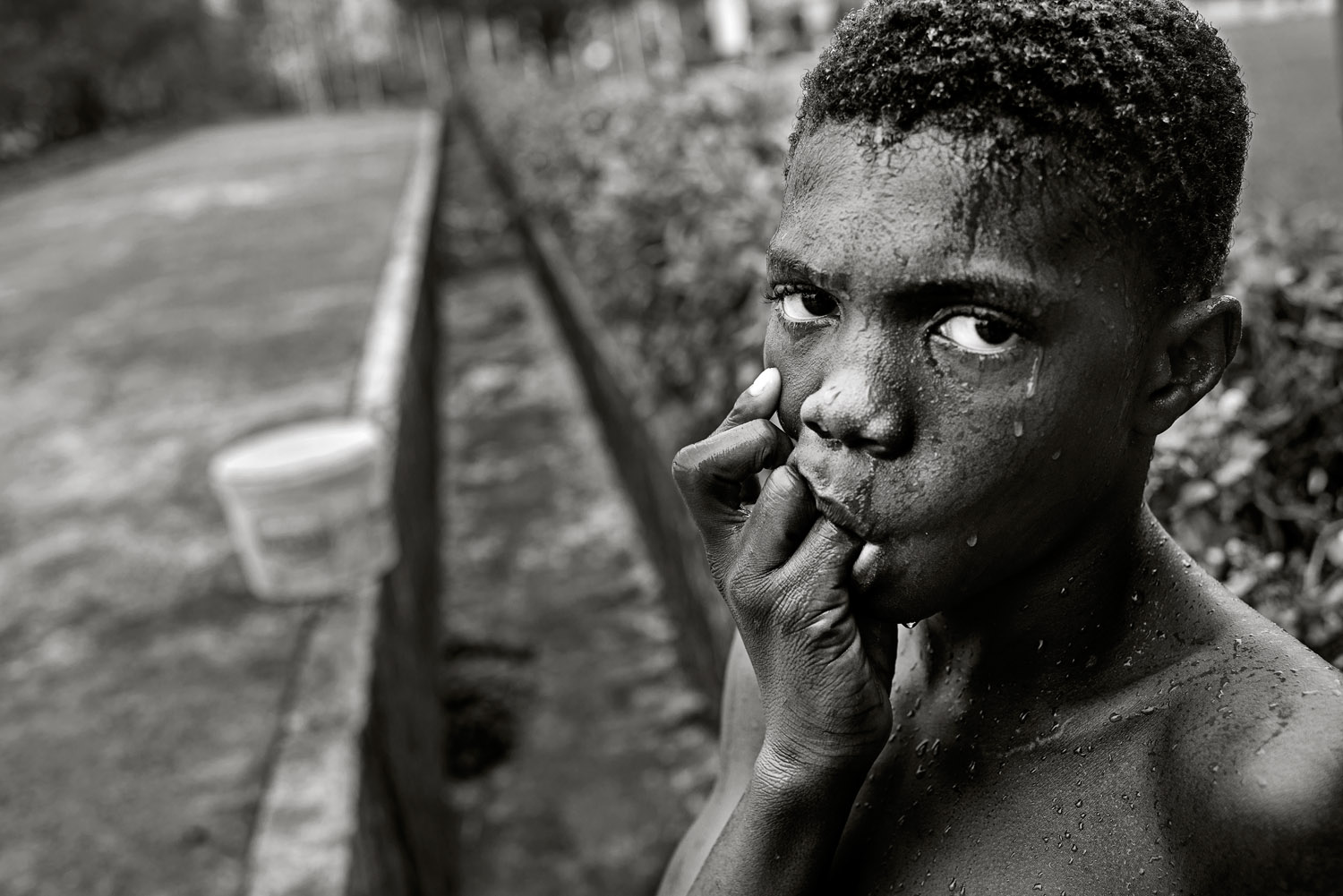  Boy from the place „Eleveneleven“ in Calabar. Most of the kids had been accused of witchcraft and ran away before the pastors could torture the innocent victims with their excorcism. 