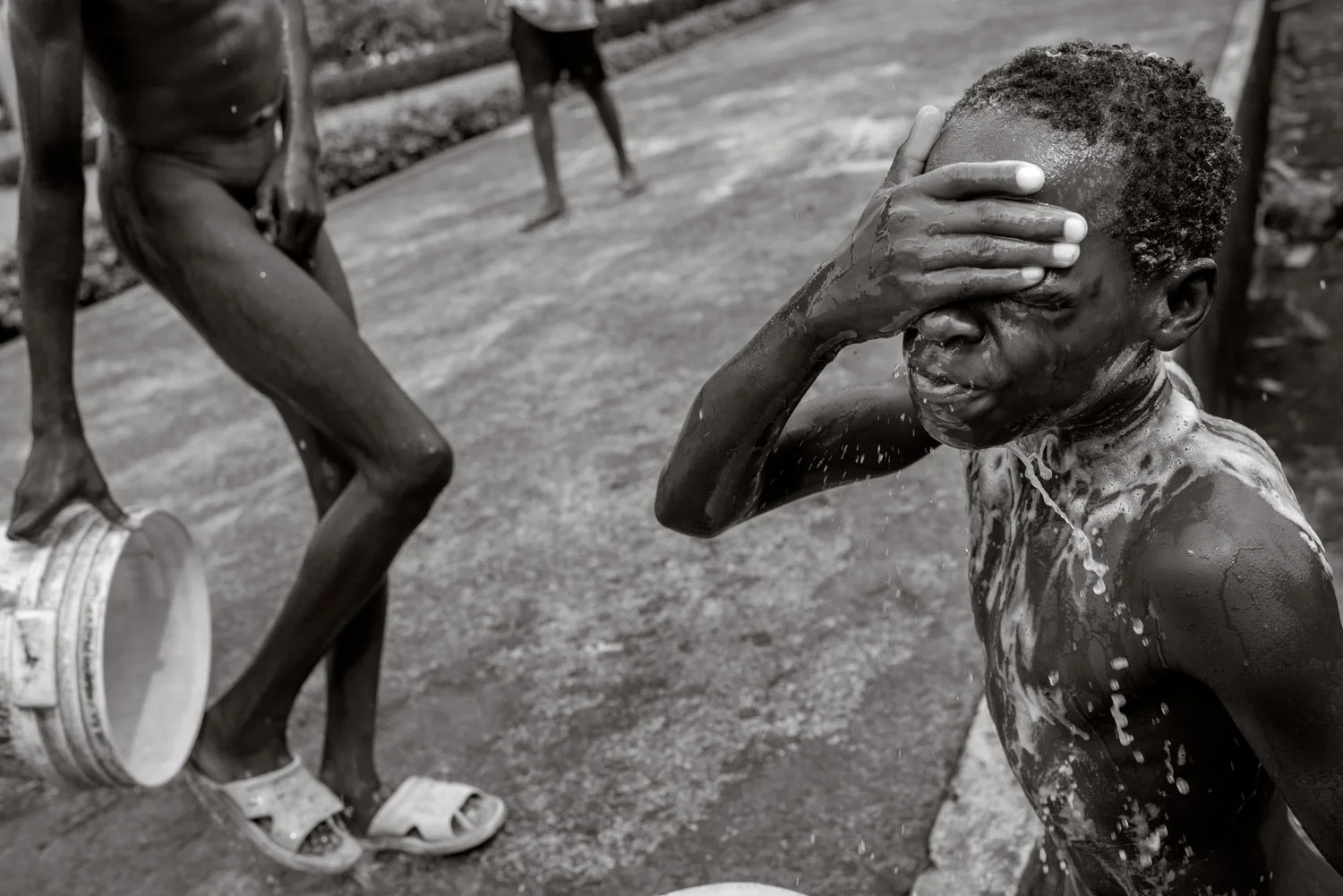 The children at Calabars "Eleveneleven" start their day with a bath.