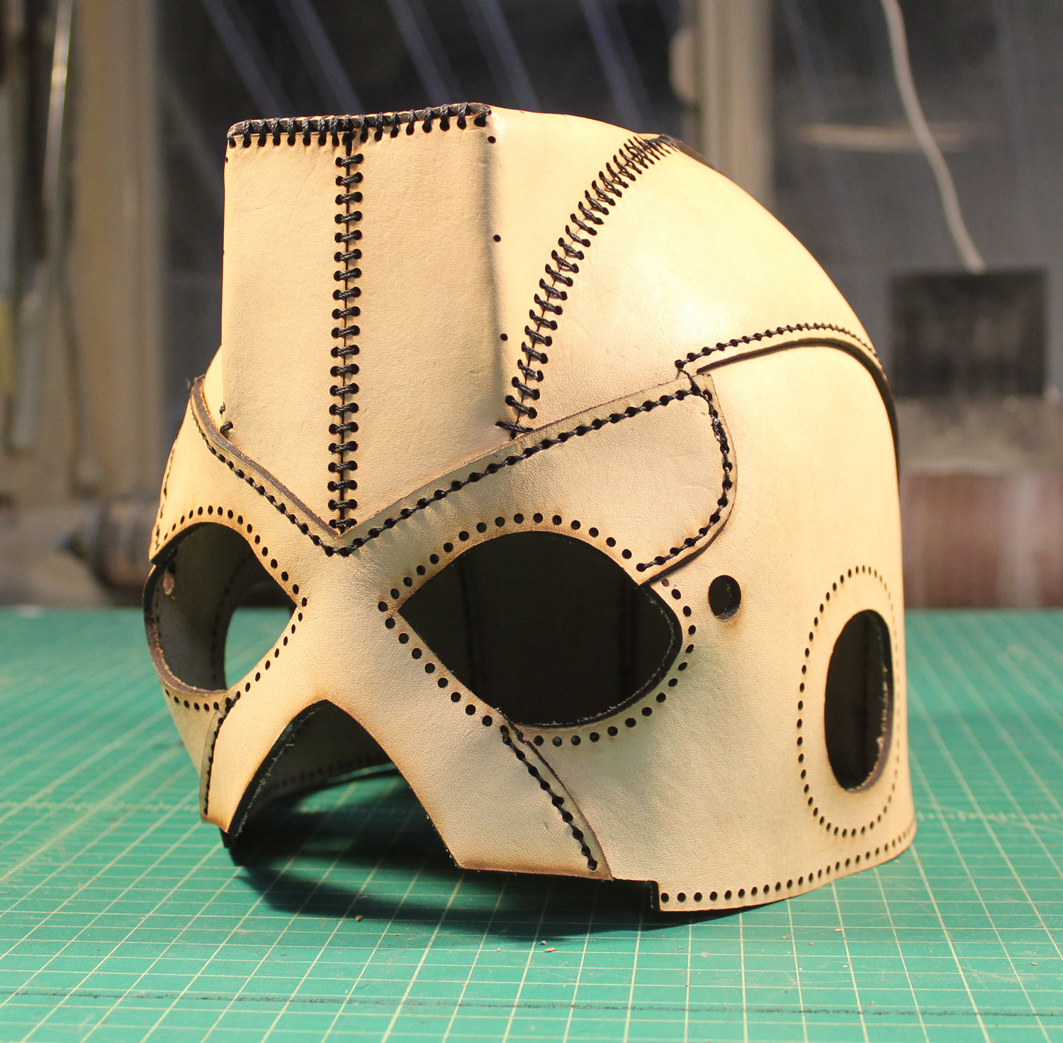 Veg tan leather pieces sewn together by hand with waxed thread