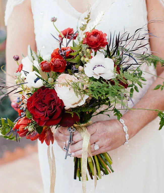 This bouquet, with skeleton keys and tied with gold ribbon