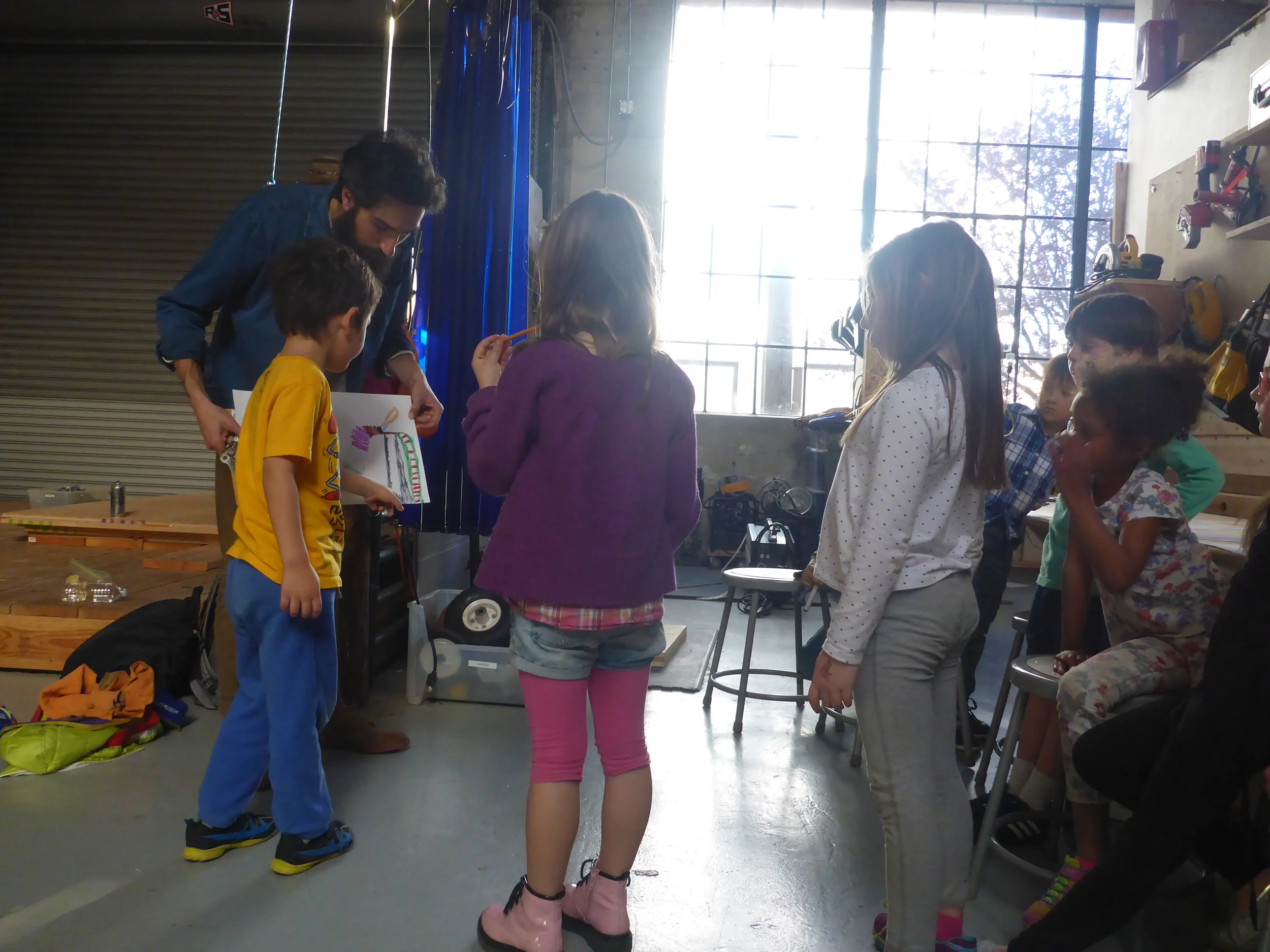 With so many great ideas some kinds got up out of their seats to get a closer look when explaining their designs.