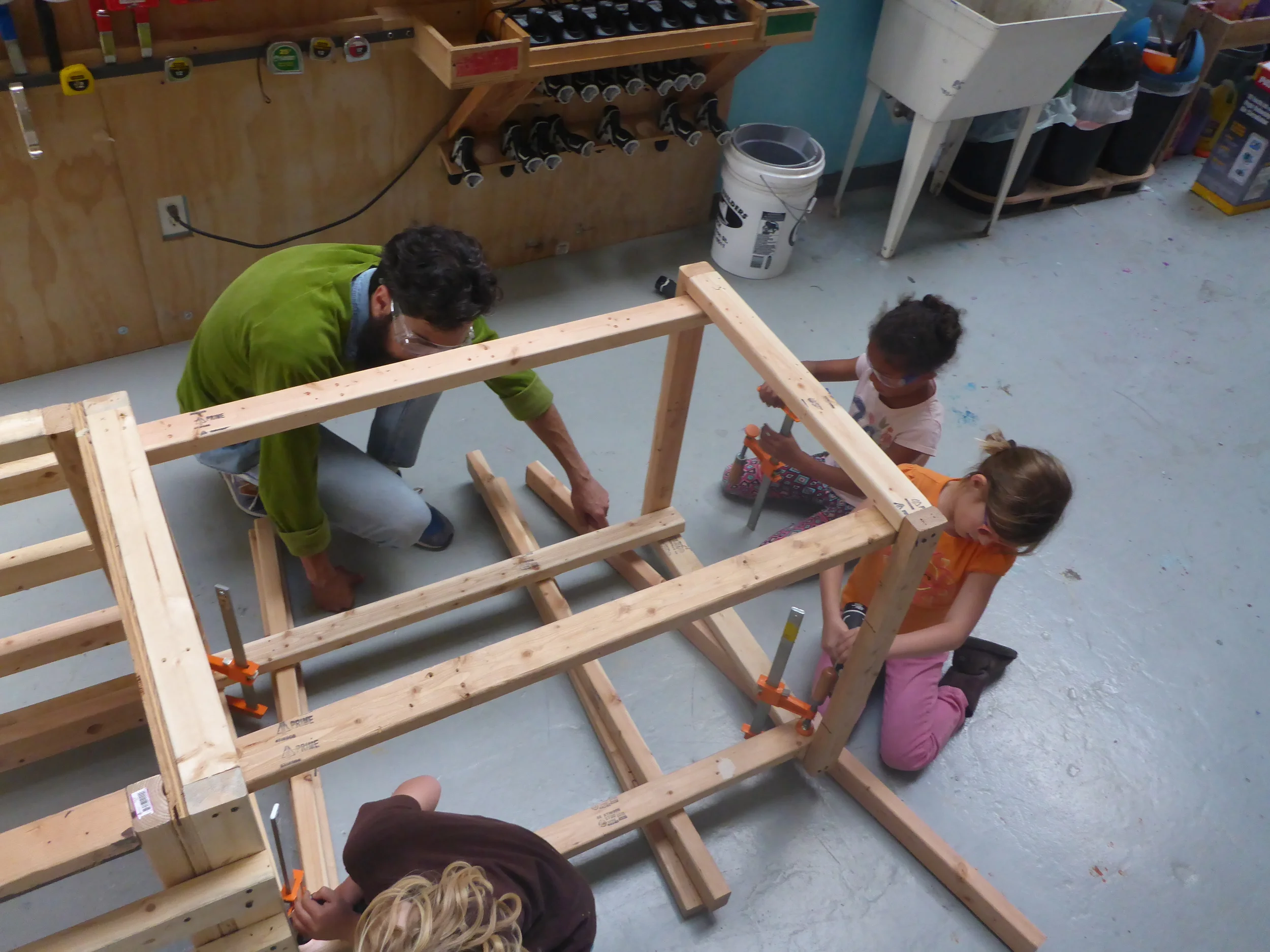 Team clamping the platform stand. 