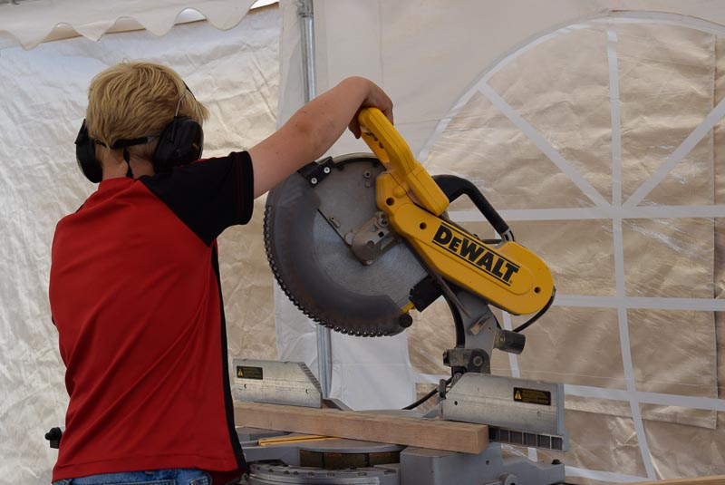  Ryker cuts an angle with the chopsaw 
