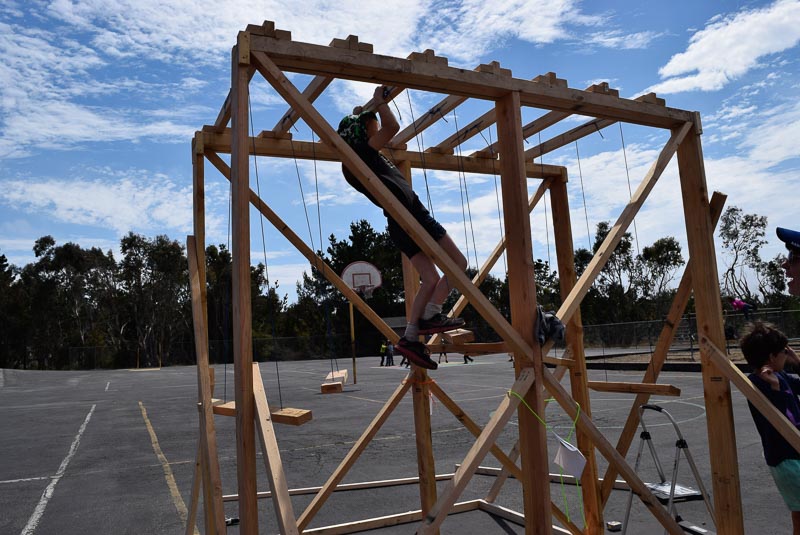  The newly-safe swings are super fun but quite difficult to play on. Because the top is close enough to the swinging steps that some people are taller, a number of strategies to cross have emerged. Some favorites are just monkey bar-ing, sitting and 
