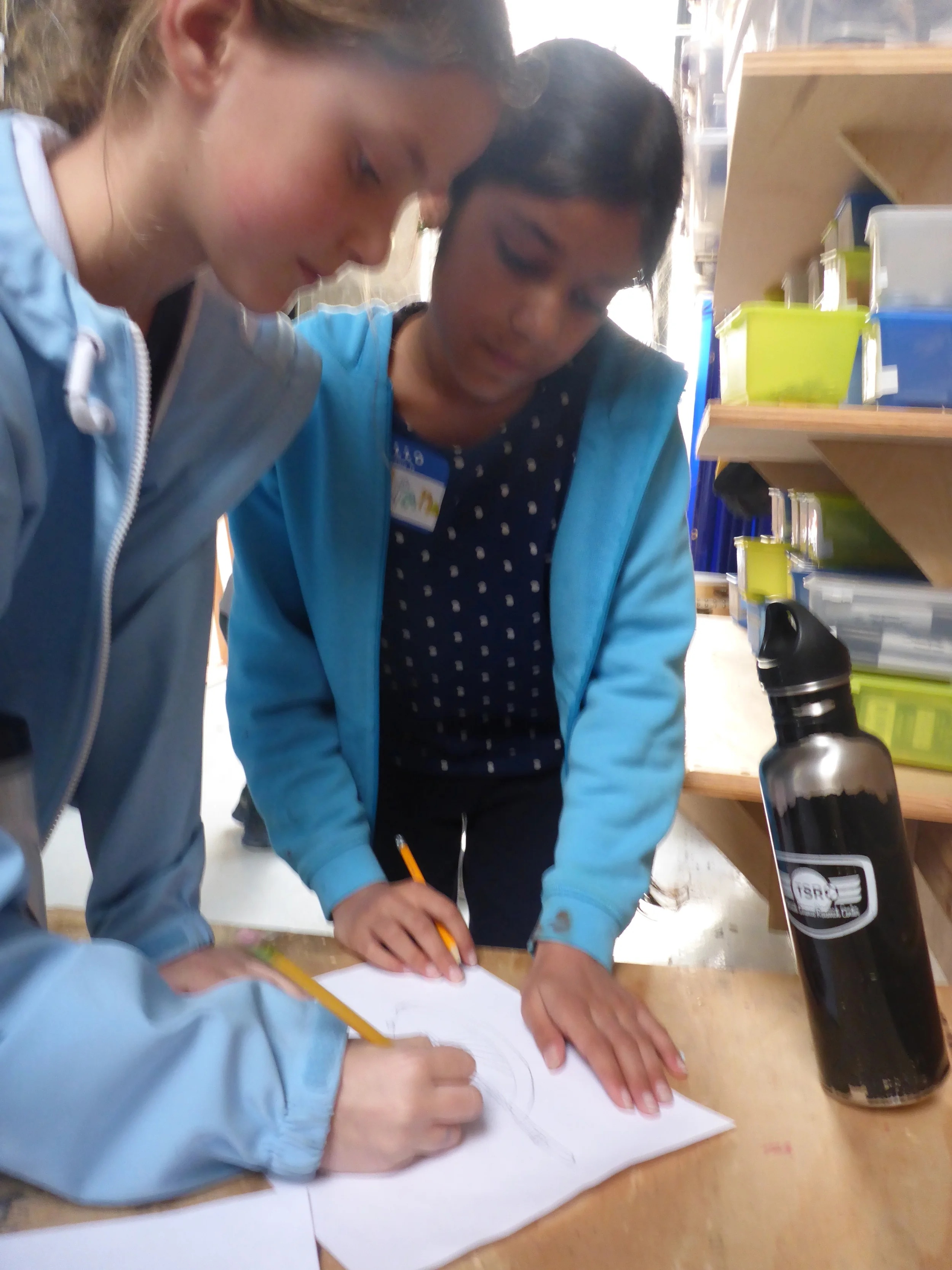 Collaborating and creating a design.