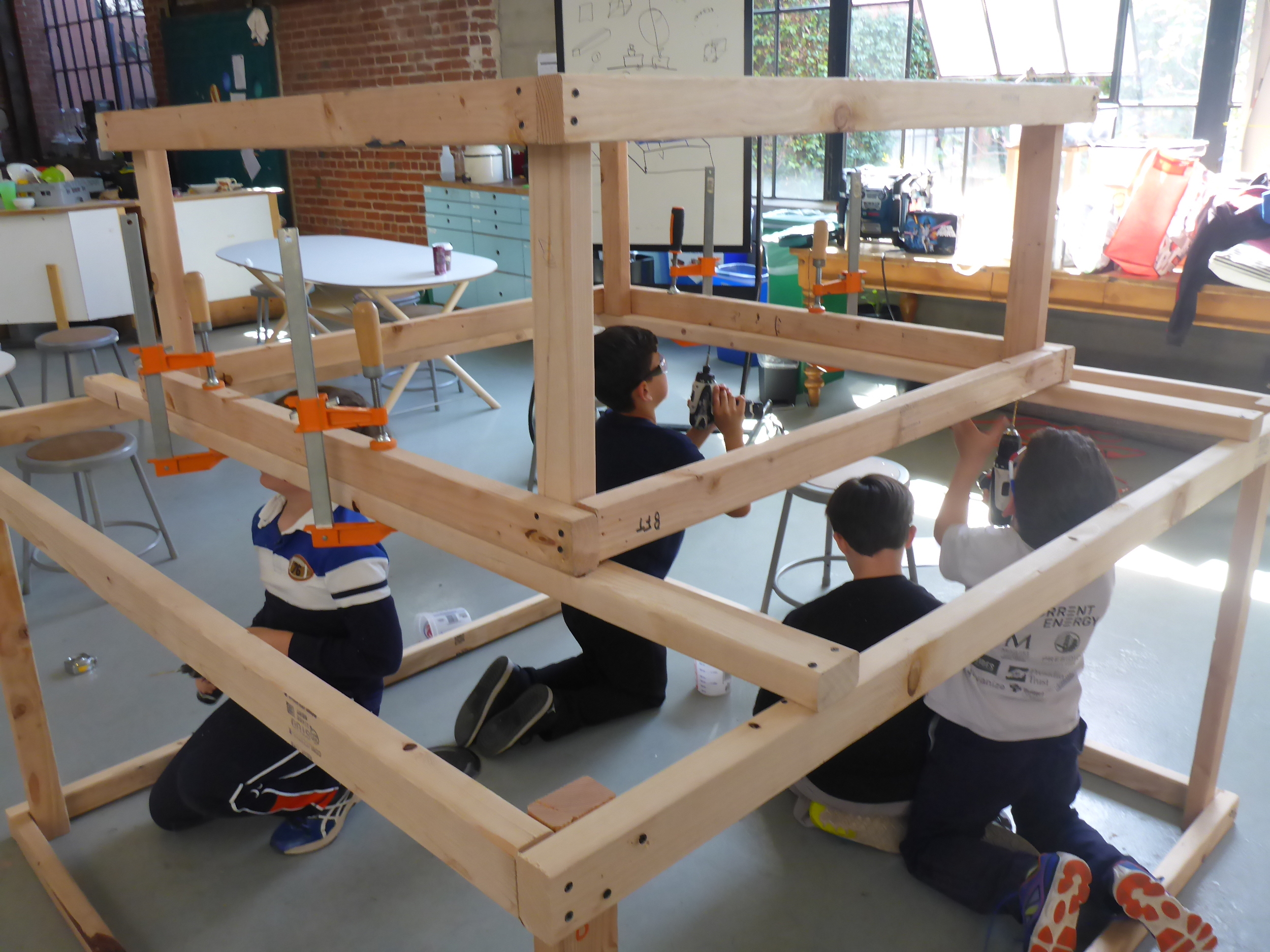 Team Cube-Layer assembles their 2 biggest layers at the end of the day.